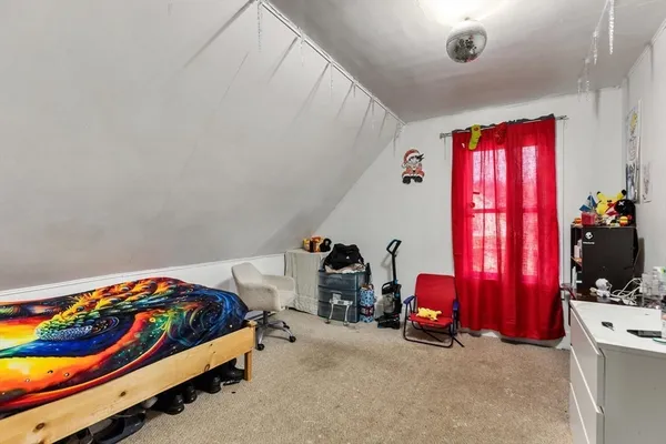 a white bath tub sitting next to a white sink