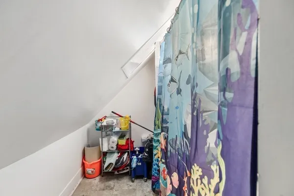 a view of a garage with an outdoor space