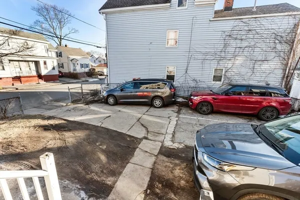 a car parked in front of a building