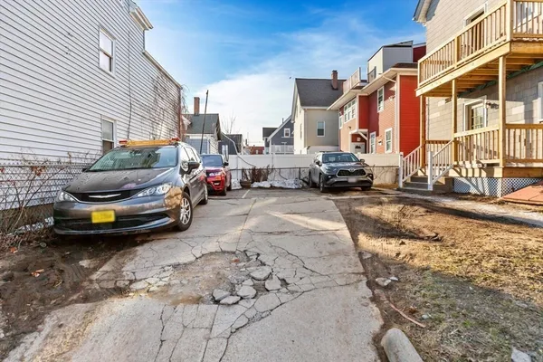a view of a street with cars