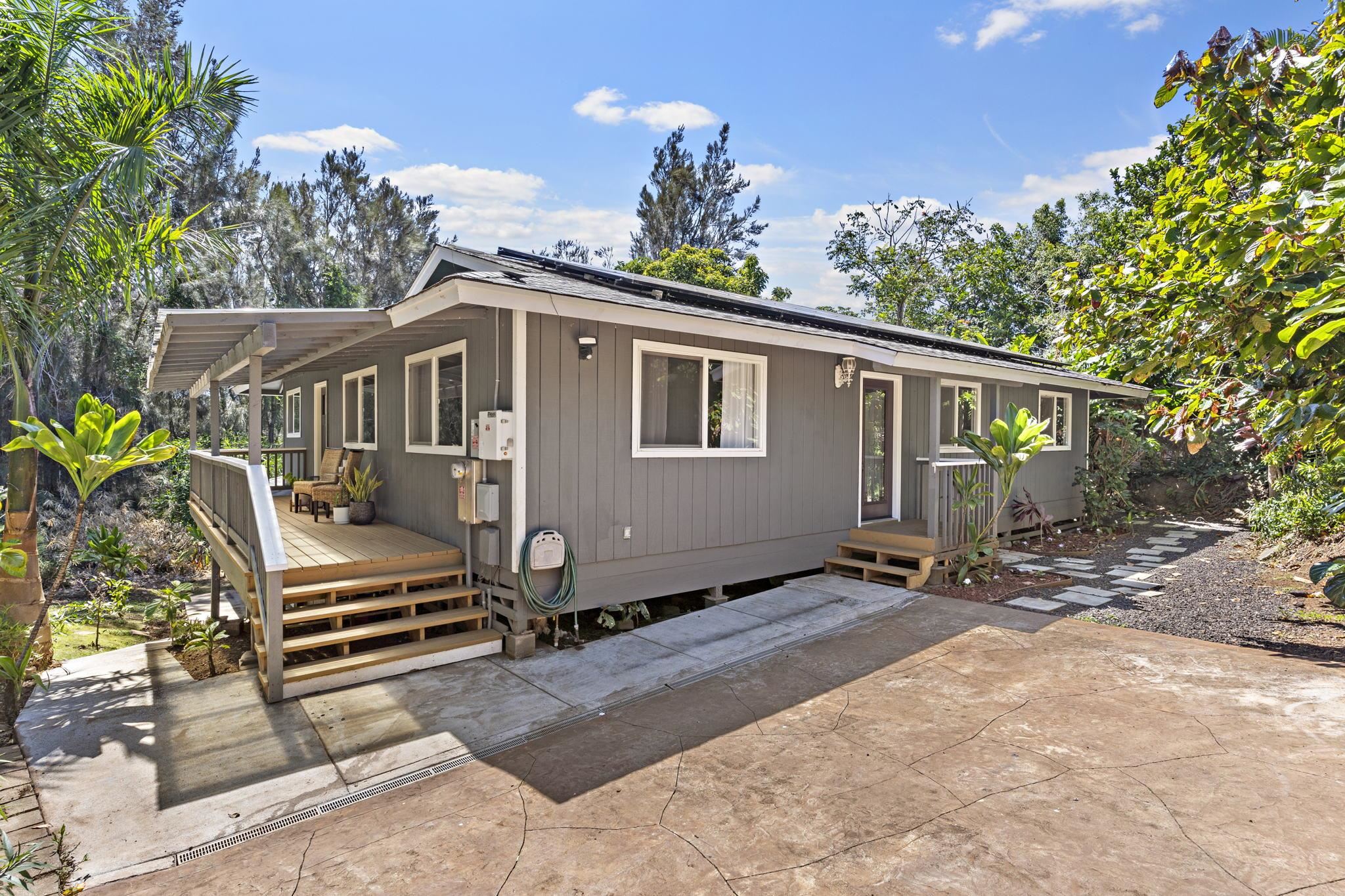 14 Kahiapo Place Haiku, HI 96708 - Photo 1 of 30 a view of a house with backyard and sitting area