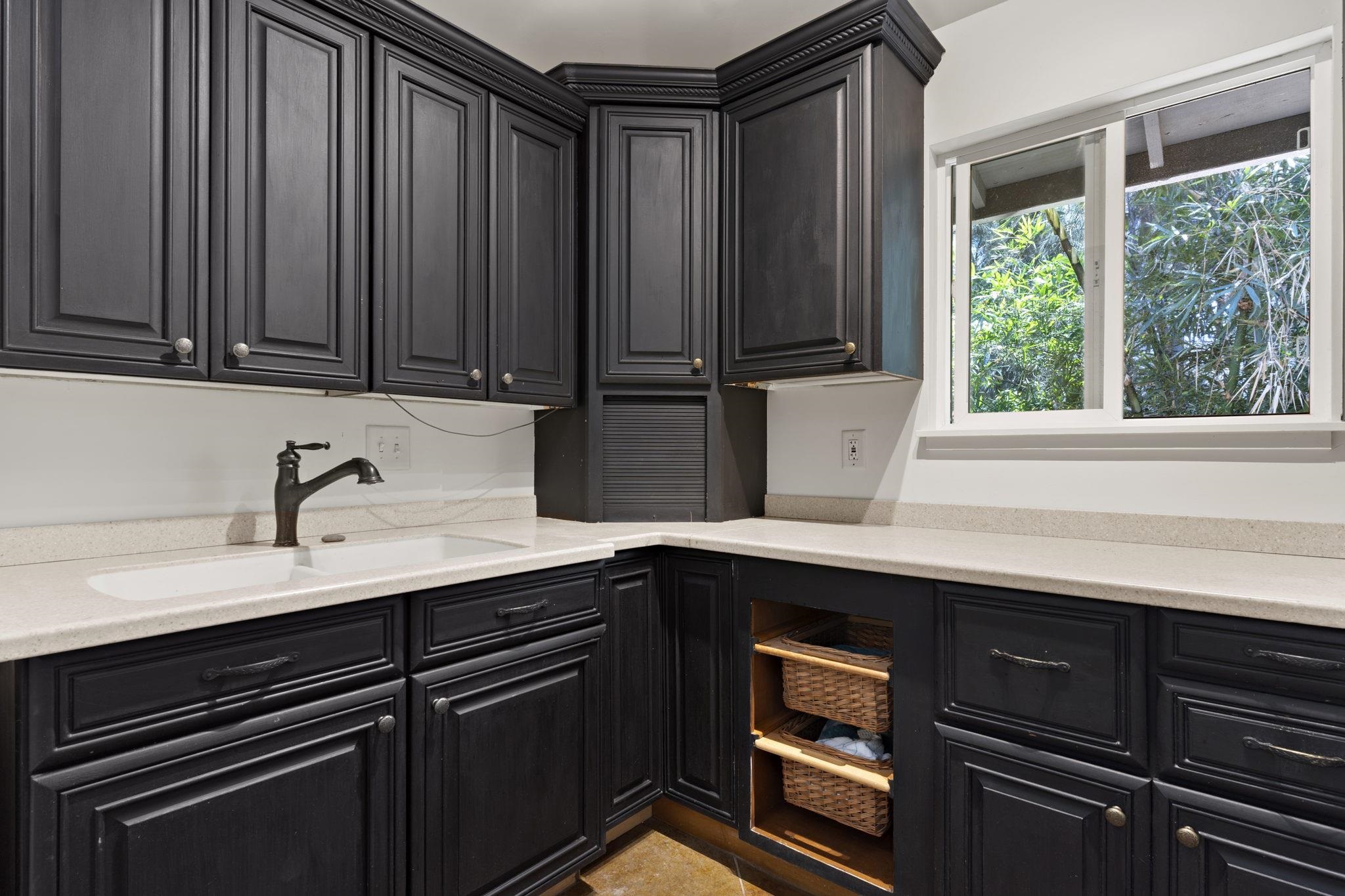 14 Kahiapo Place Haiku, HI 96708 - Photo 26 of 30 a kitchen with a sink and a window