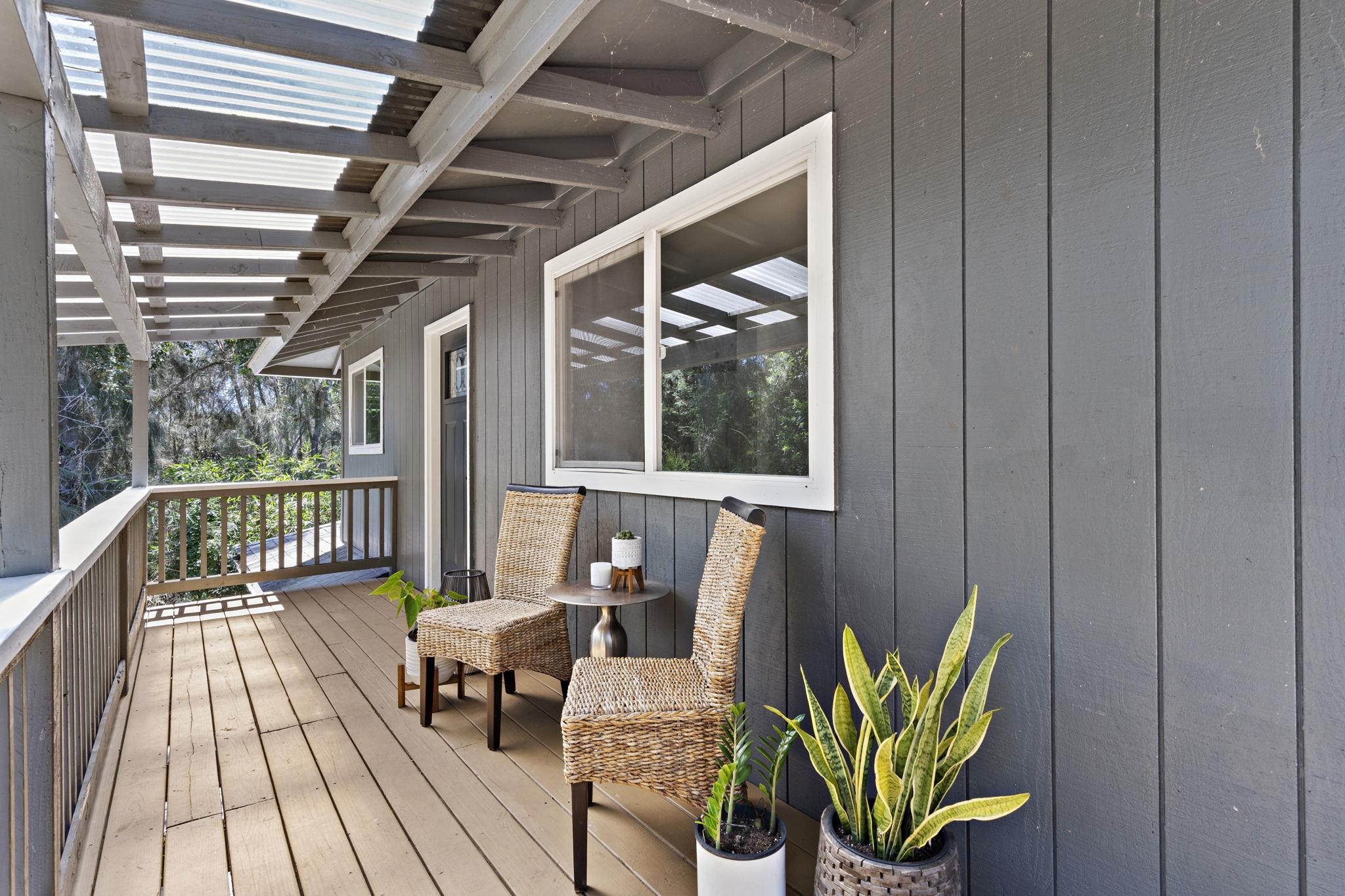 14 Kahiapo Place Haiku, HI 96708 - Photo 29 of 30 a balcony with furniture and a potted plant