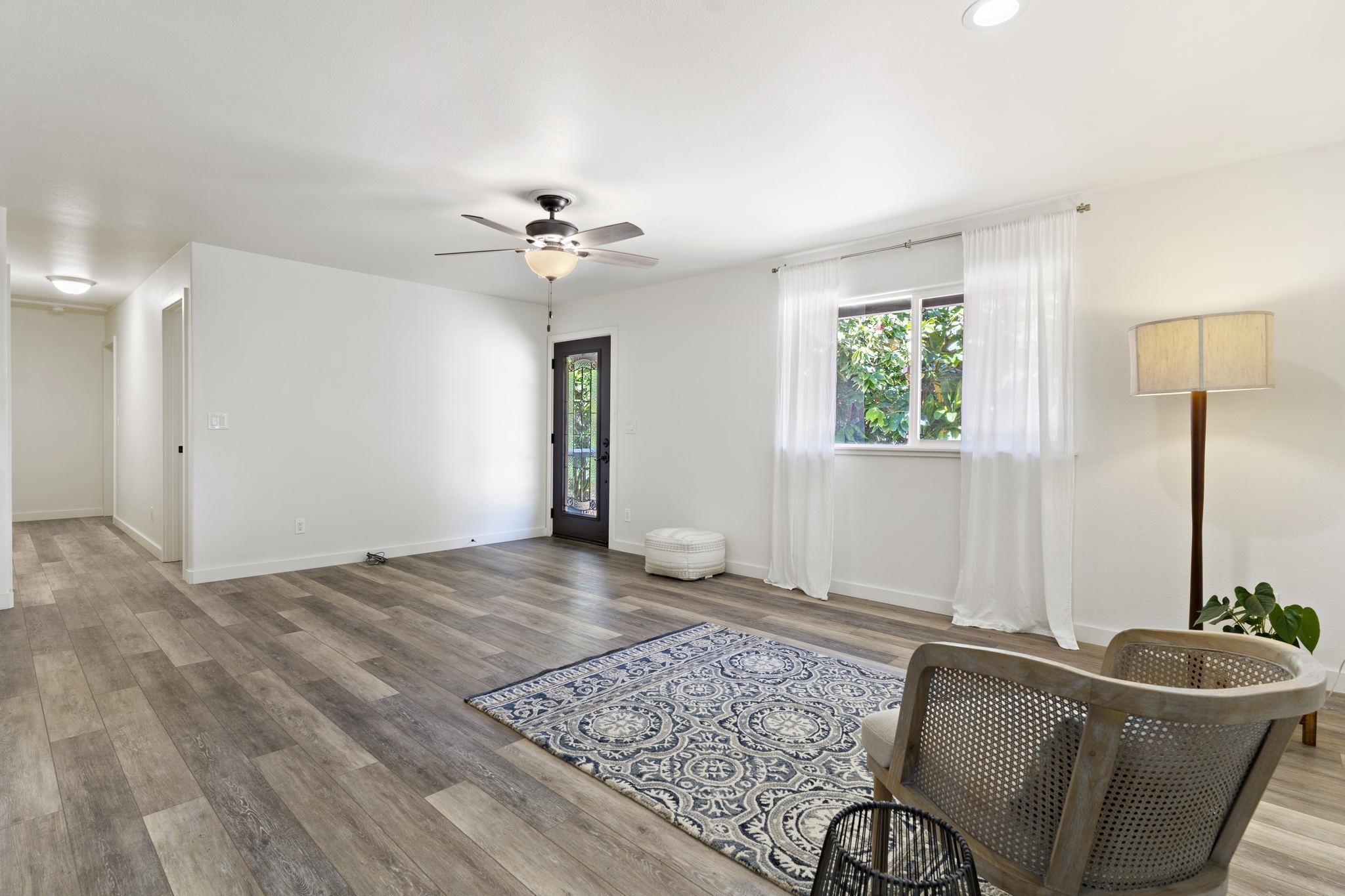 14 Kahiapo Place Haiku, HI 96708 - Photo 6 of 30 a living room with furniture and a chandelier