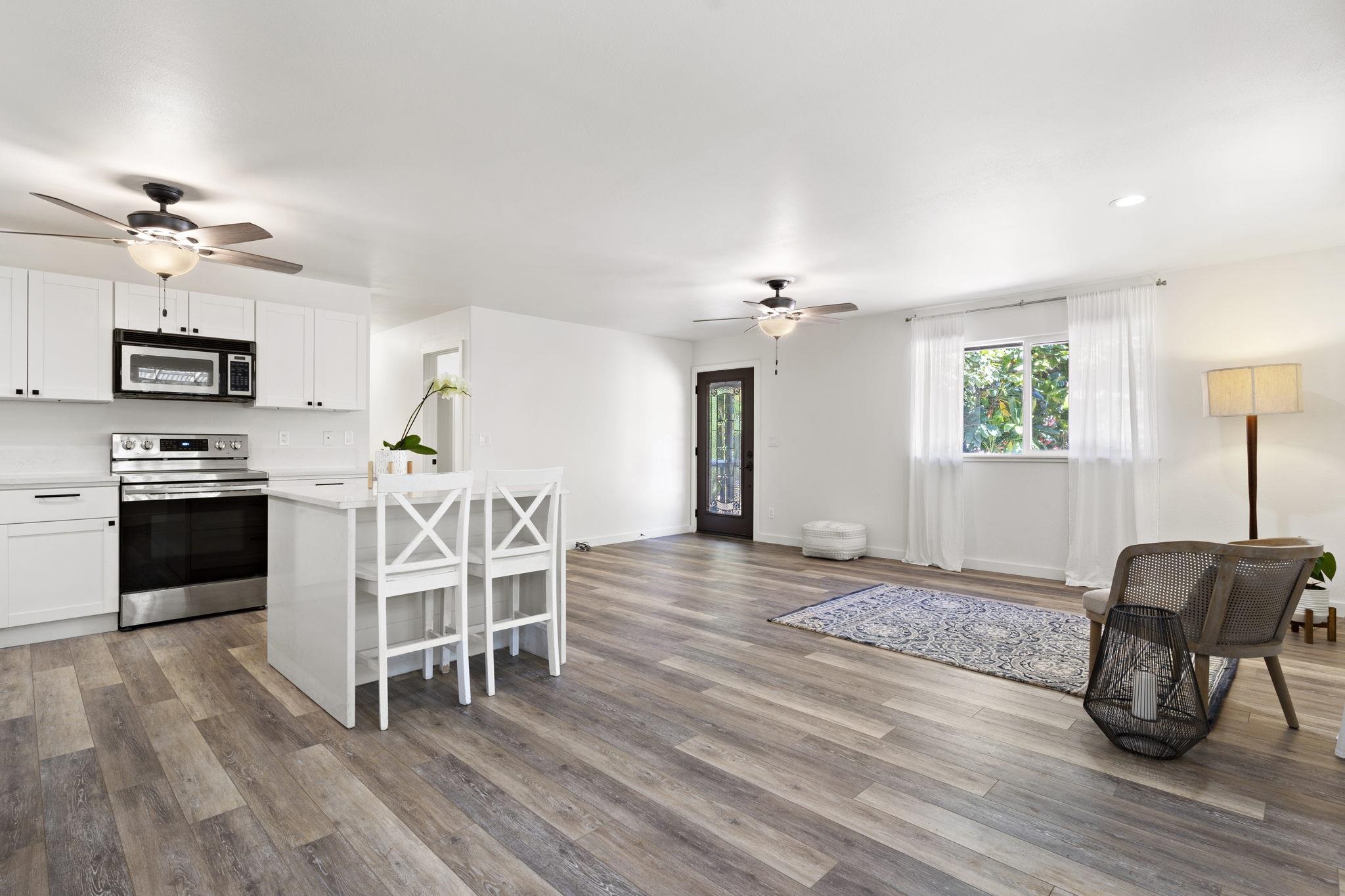 14 Kahiapo Place Haiku, HI 96708 - Photo 8 of 30 a view of a dining room with furniture and wooden floor