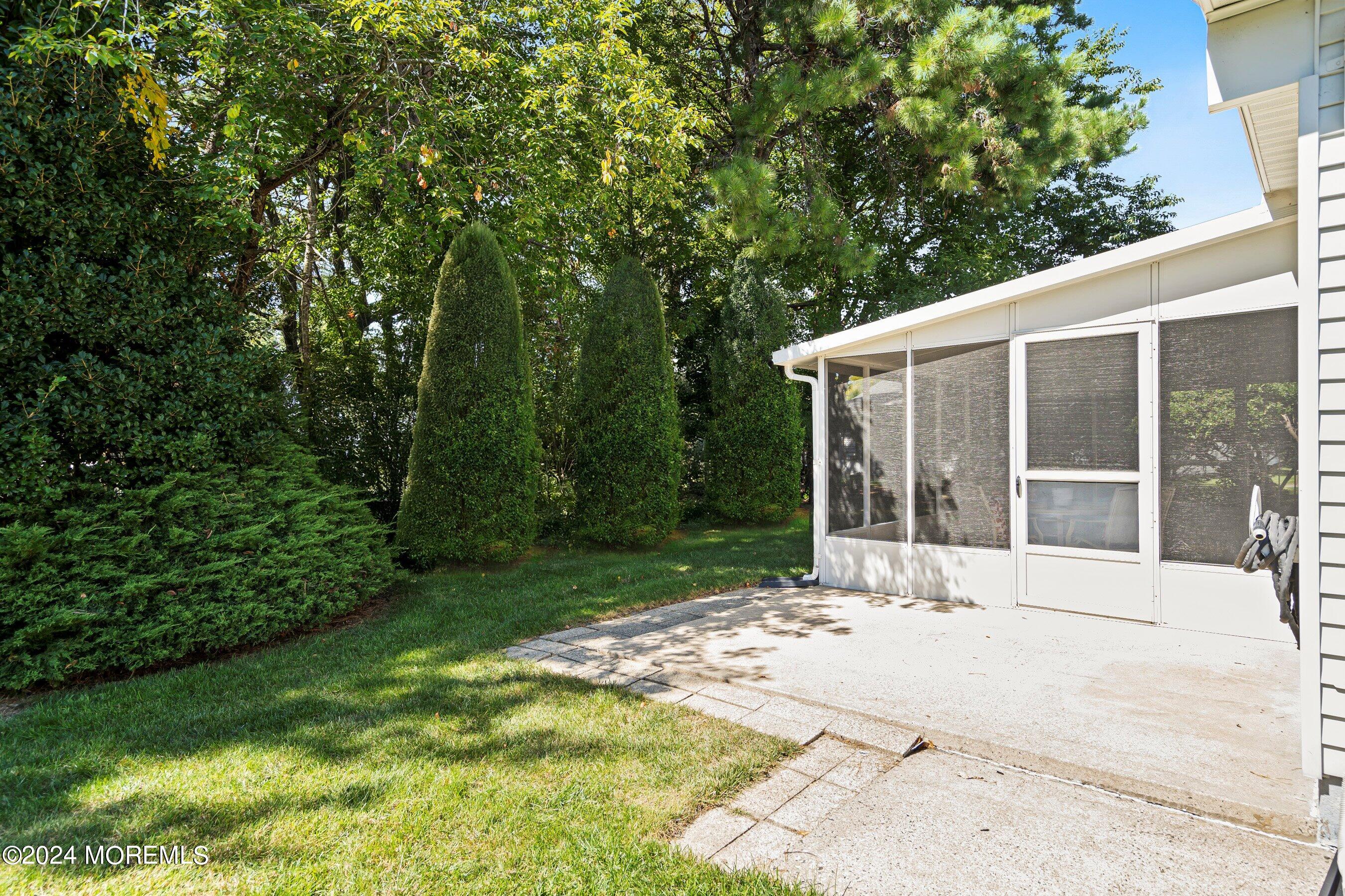 21 Tapola Road Toms River, NJ 08757 - Photo 18 of 22 a view of a house with backyard and garden