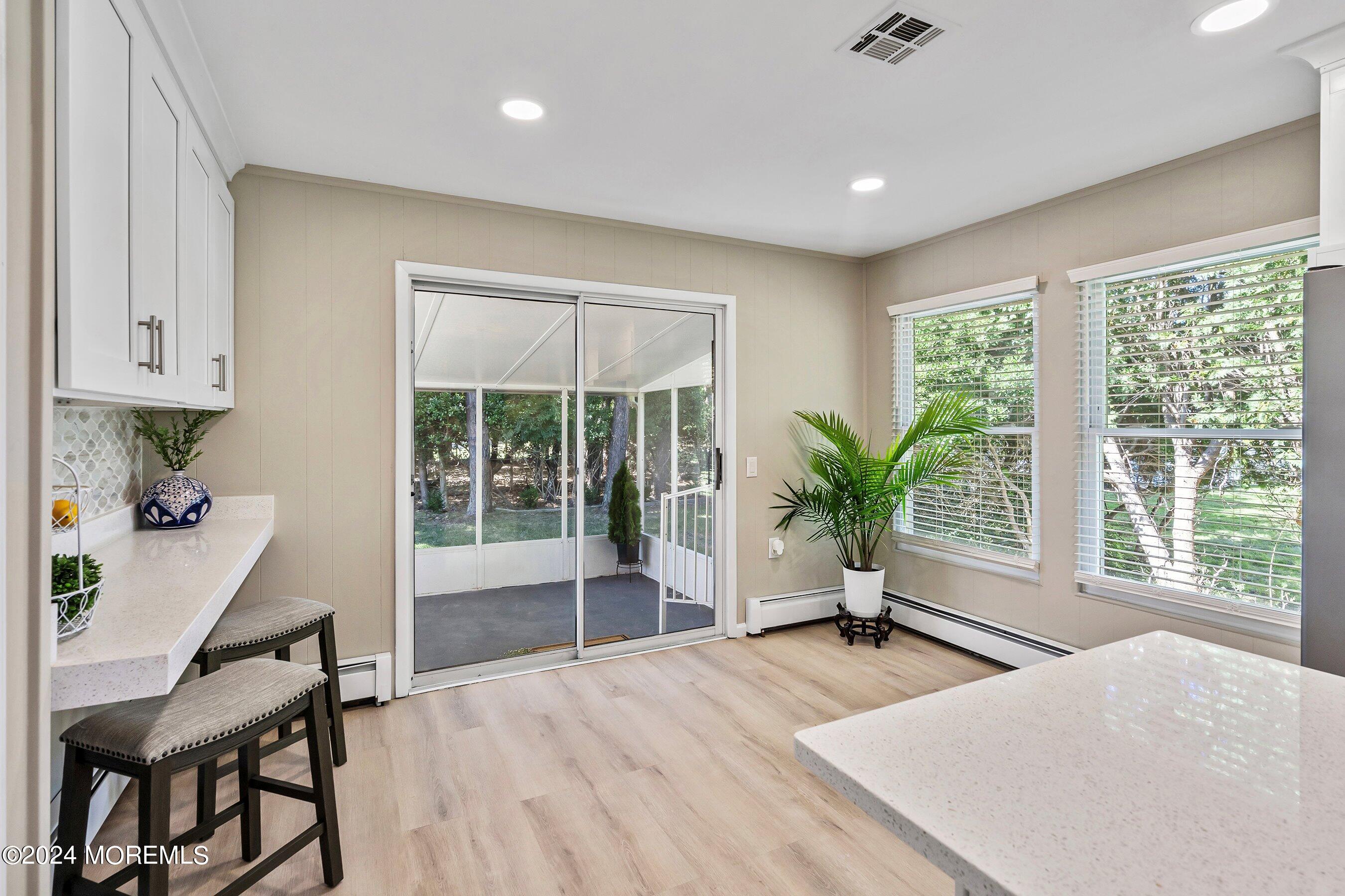 21 Tapola Road Toms River, NJ 08757 - Photo 10 of 22 a room with window and a potted plant