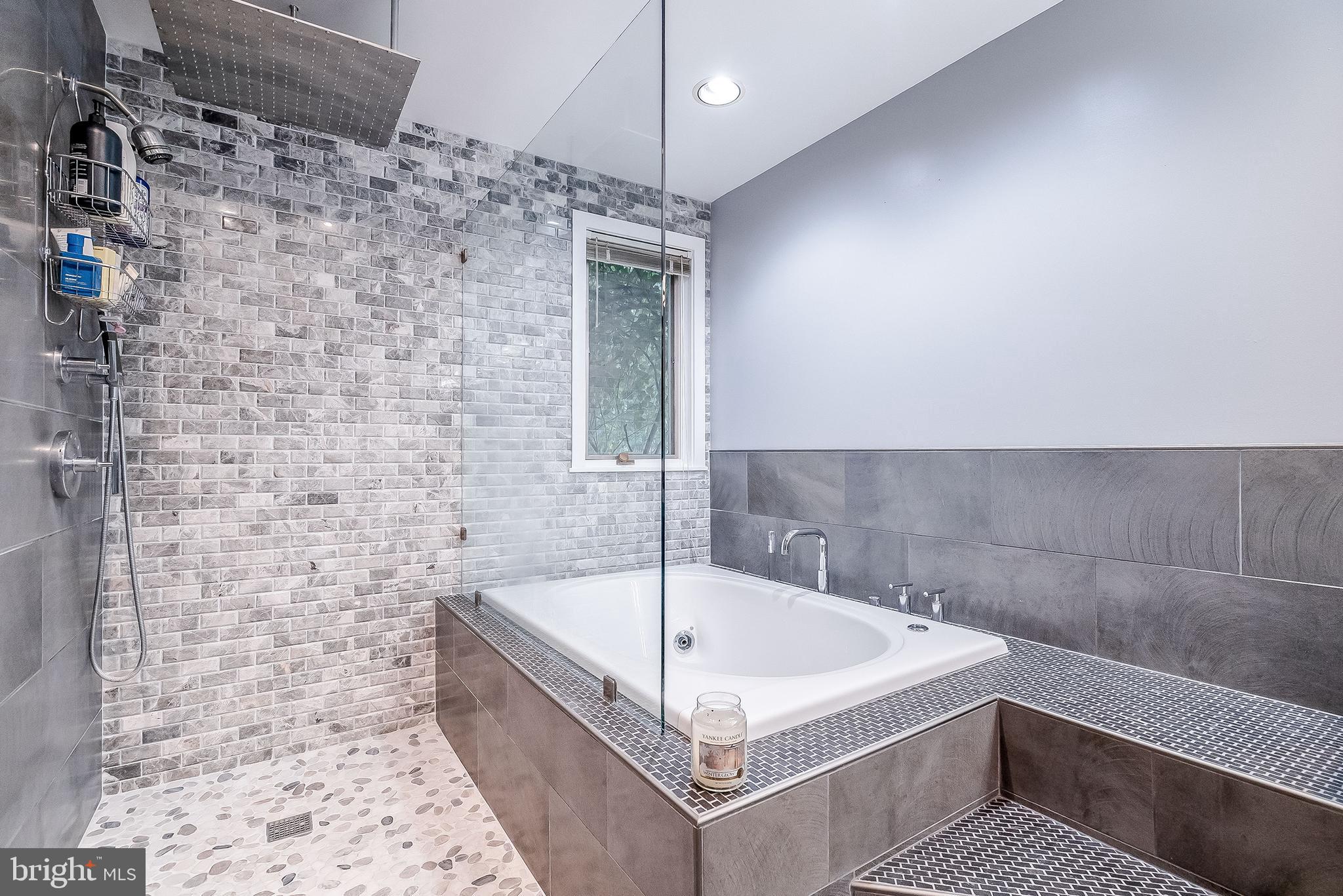 1361 South Leopard Road Berwyn, PA 19312 - Photo 15 of 33 a bathroom with a bathtub and shower