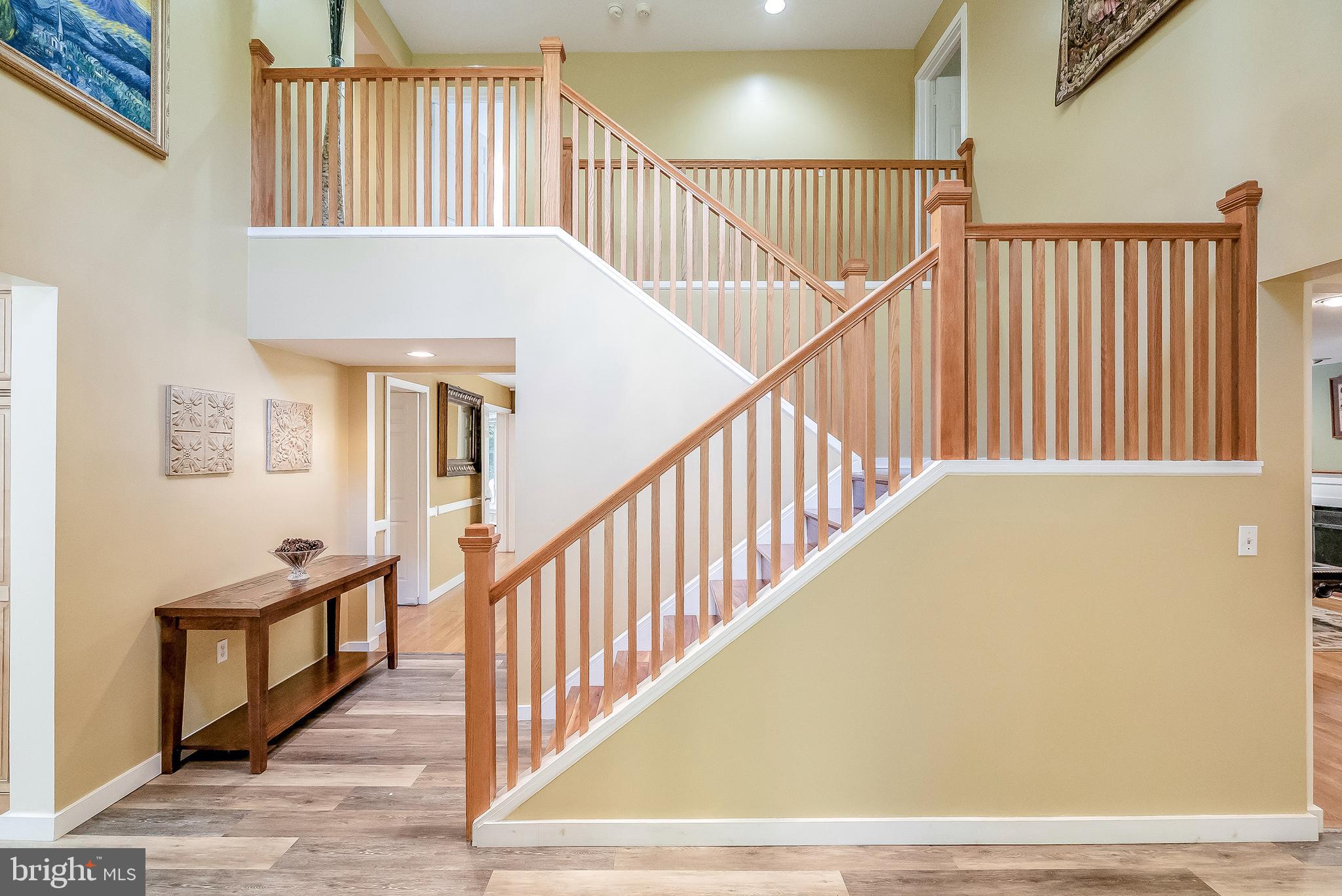 1361 South Leopard Road Berwyn, PA 19312 - Photo 20 of 33 a view of staircase with lots of frames on wall and a window