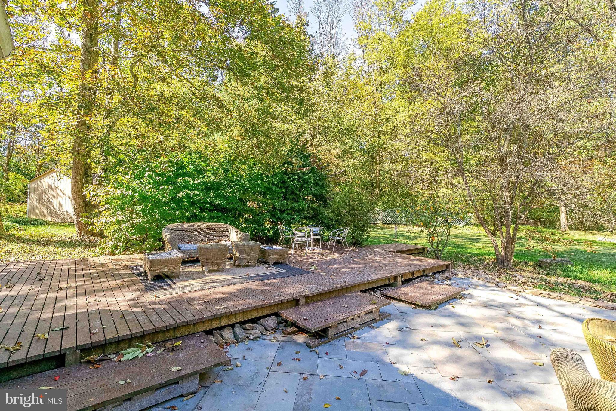1361 South Leopard Road Berwyn, PA 19312 - Photo 27 of 33 a view of backyard with wooden fence and trees