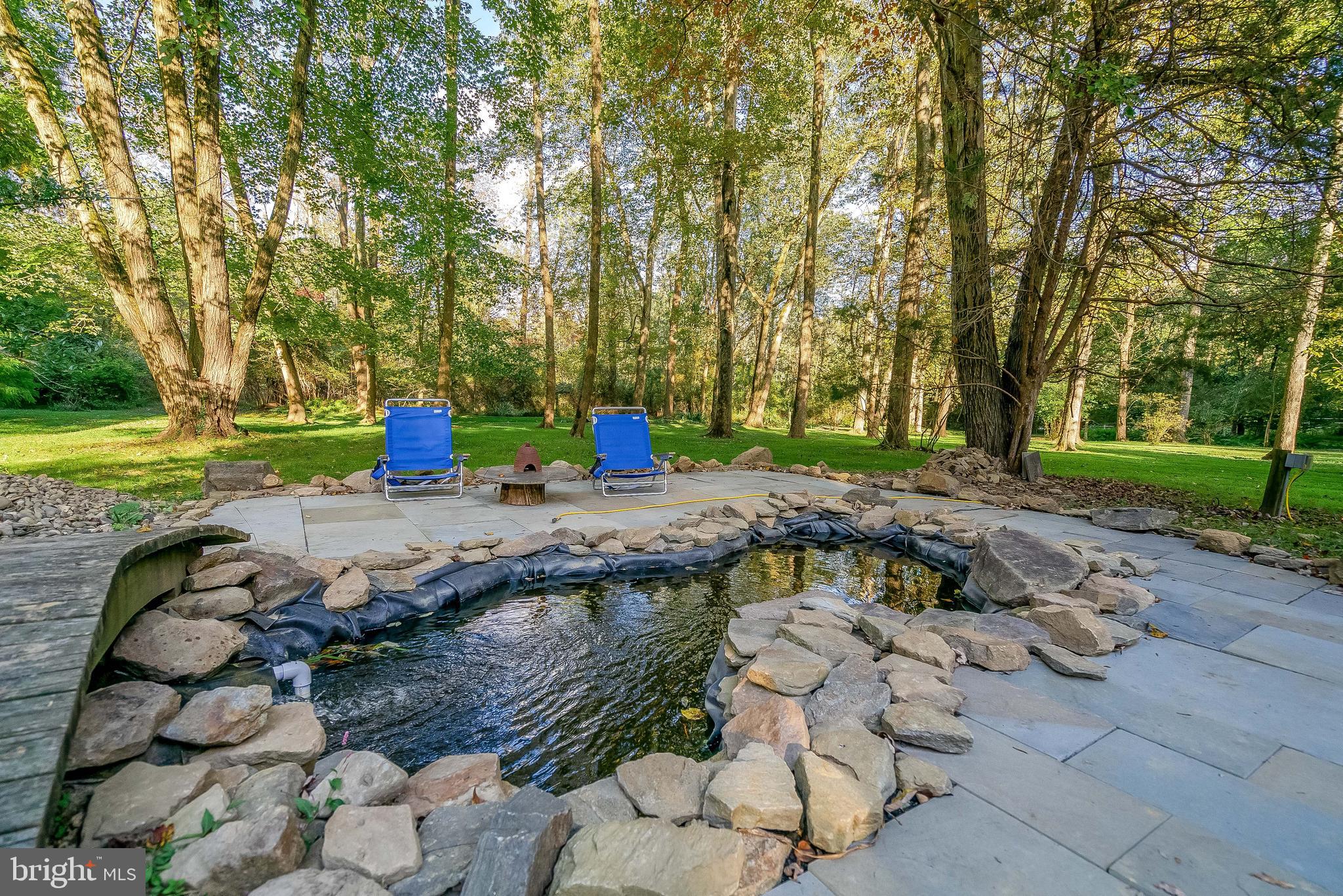1361 South Leopard Road Berwyn, PA 19312 - Photo 28 of 33 a view of a lake with a sitting area