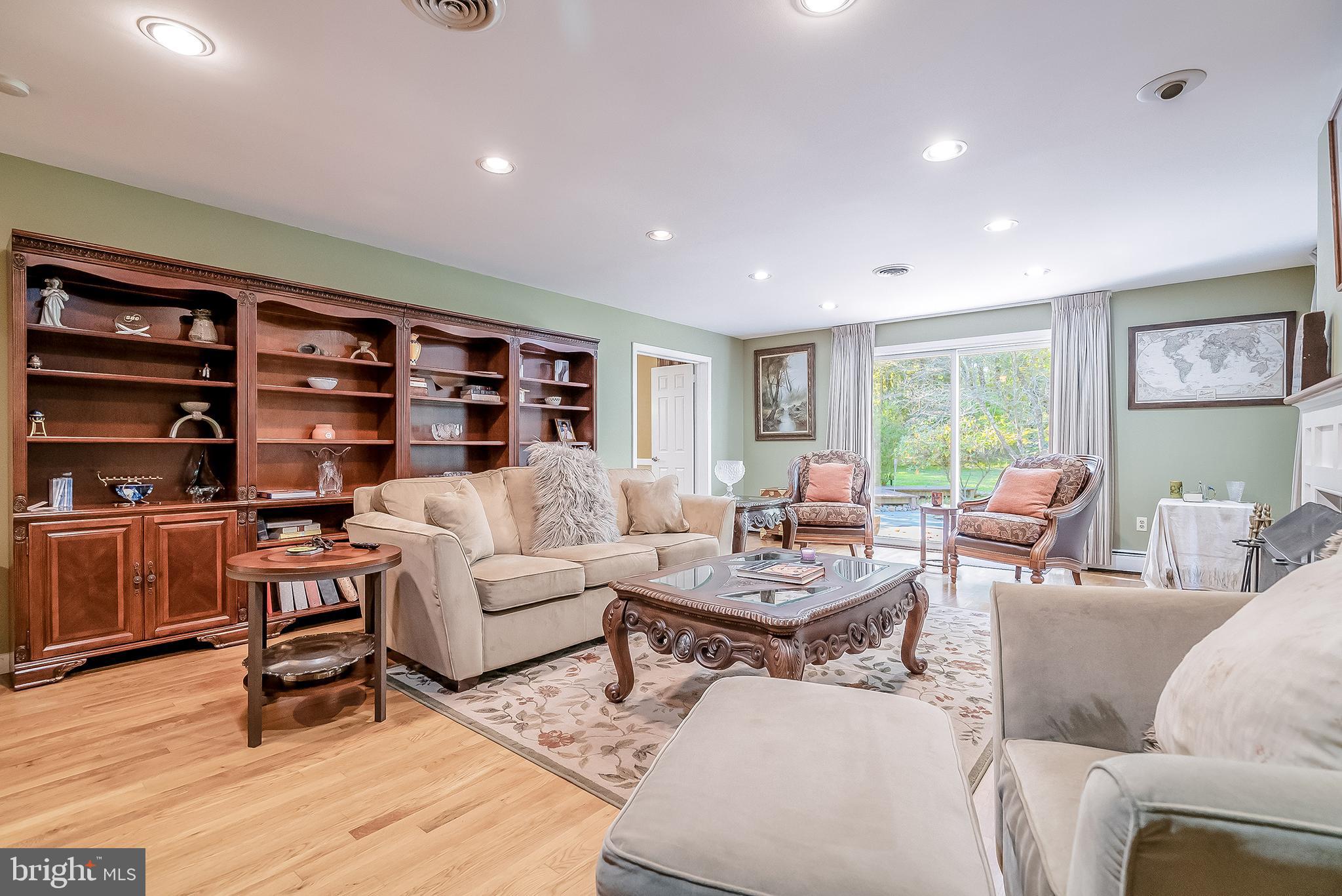 1361 South Leopard Road Berwyn, PA 19312 - Photo 4 of 33 a living room with furniture and a wooden floor