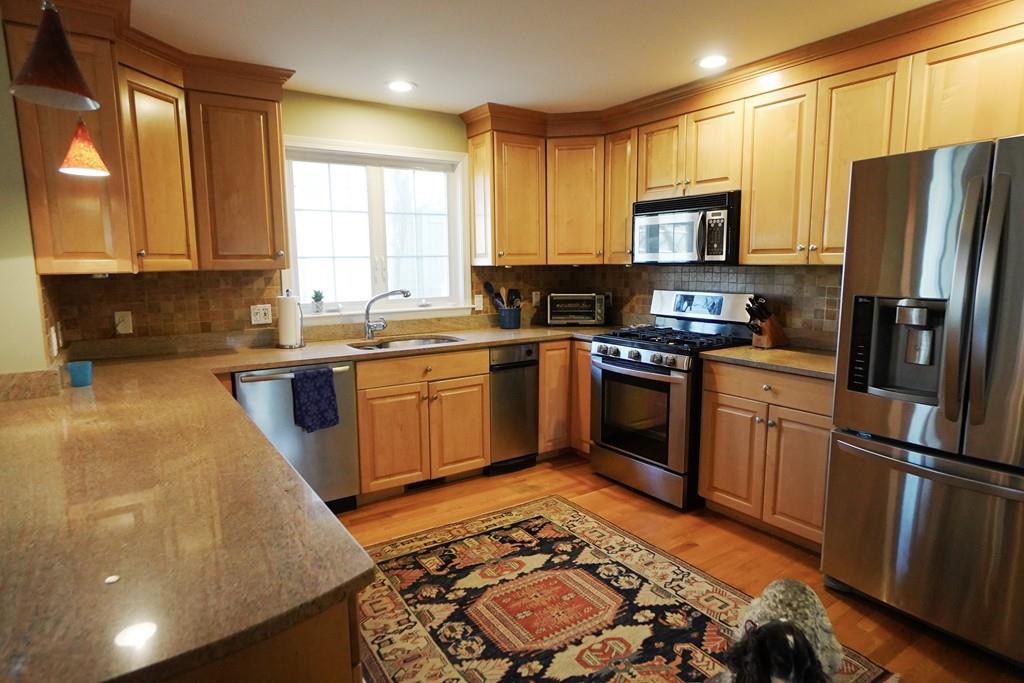 2 Dodge Road Marblehead, MA 01945 - Photo 2 of 16 a kitchen with a sink stove and refrigerator