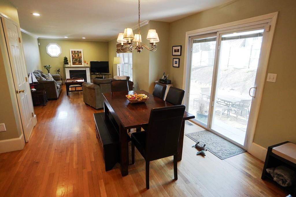 2 Dodge Road Marblehead, MA 01945 - Photo 5 of 16 a view of a dining room with furniture a chandelier and wooden floor