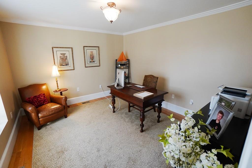 2 Dodge Road Marblehead, MA 01945 - Photo 7 of 16 a living room with furniture and a mirror