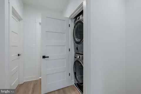 a view of a storage & utility room with washer and dryer