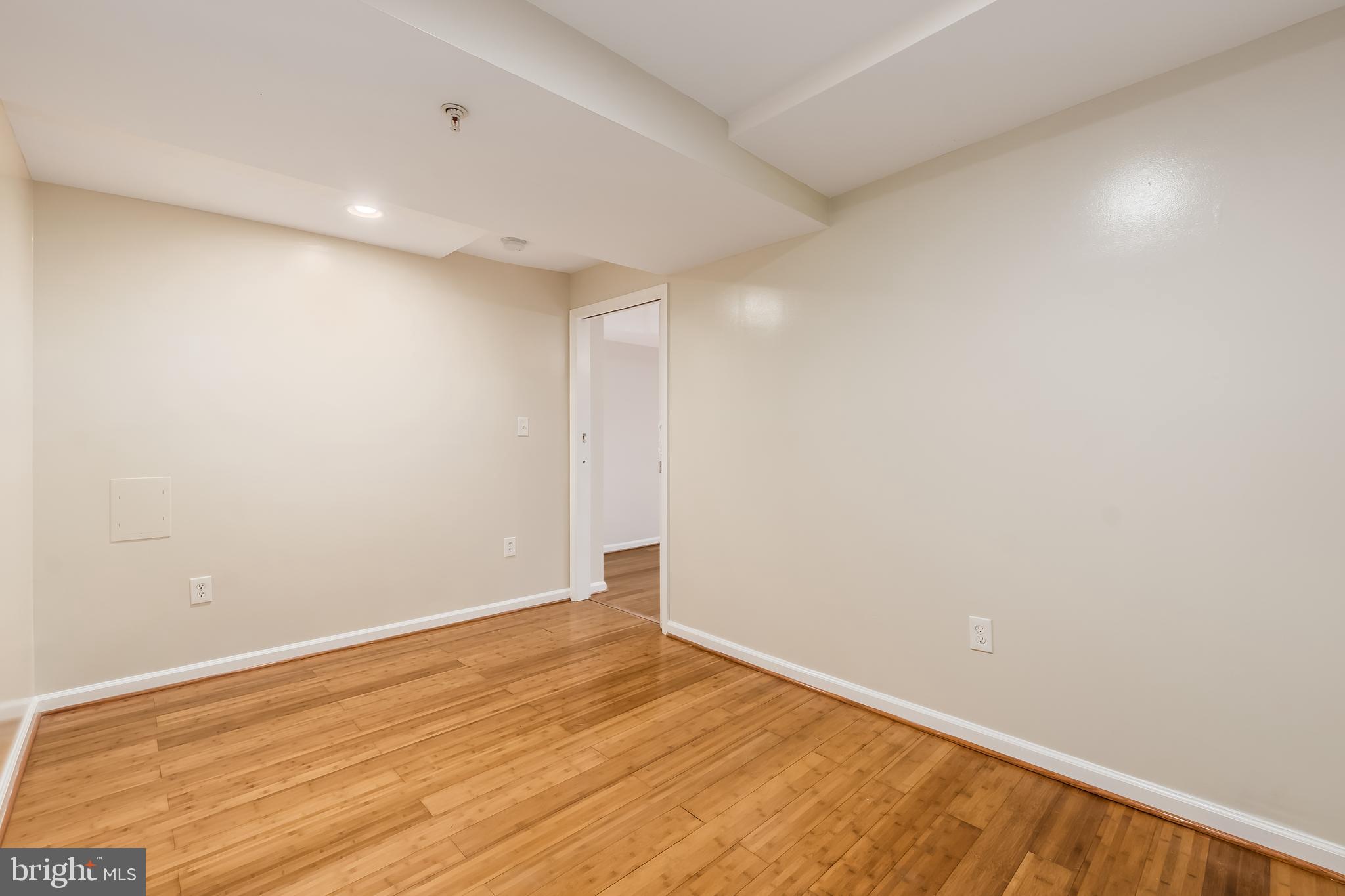 1713 Euclid Street Northwest, Unit 1 Washington, DC 20009 - Photo 17 of 27 a view of an empty room