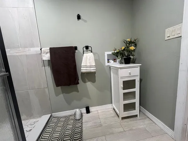 a bathroom with a sink and toilet