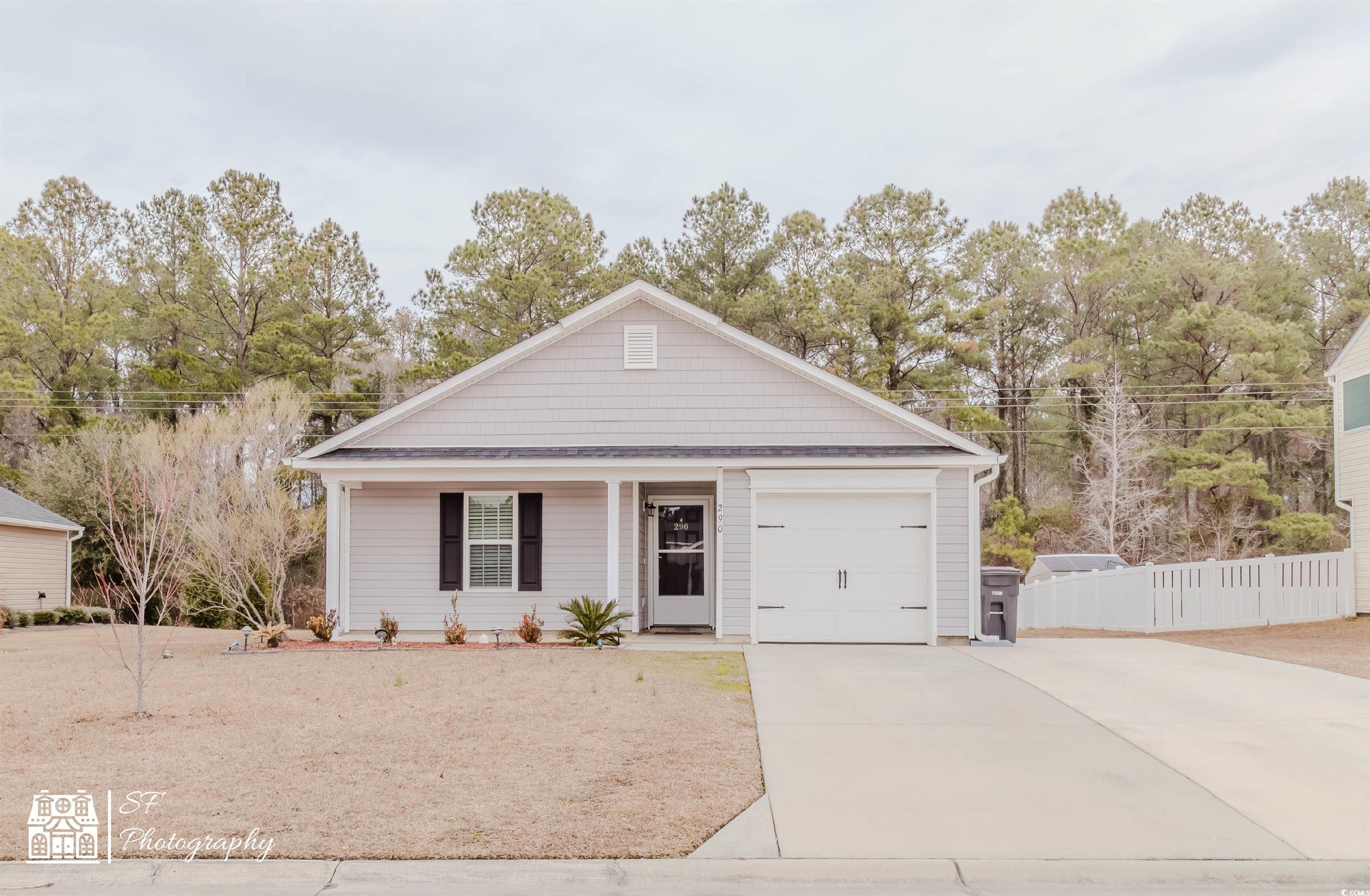 290 Blue Rock Drive Longs, SC 29568 - Photo 1 of 21 View of front of property featuring a garage
