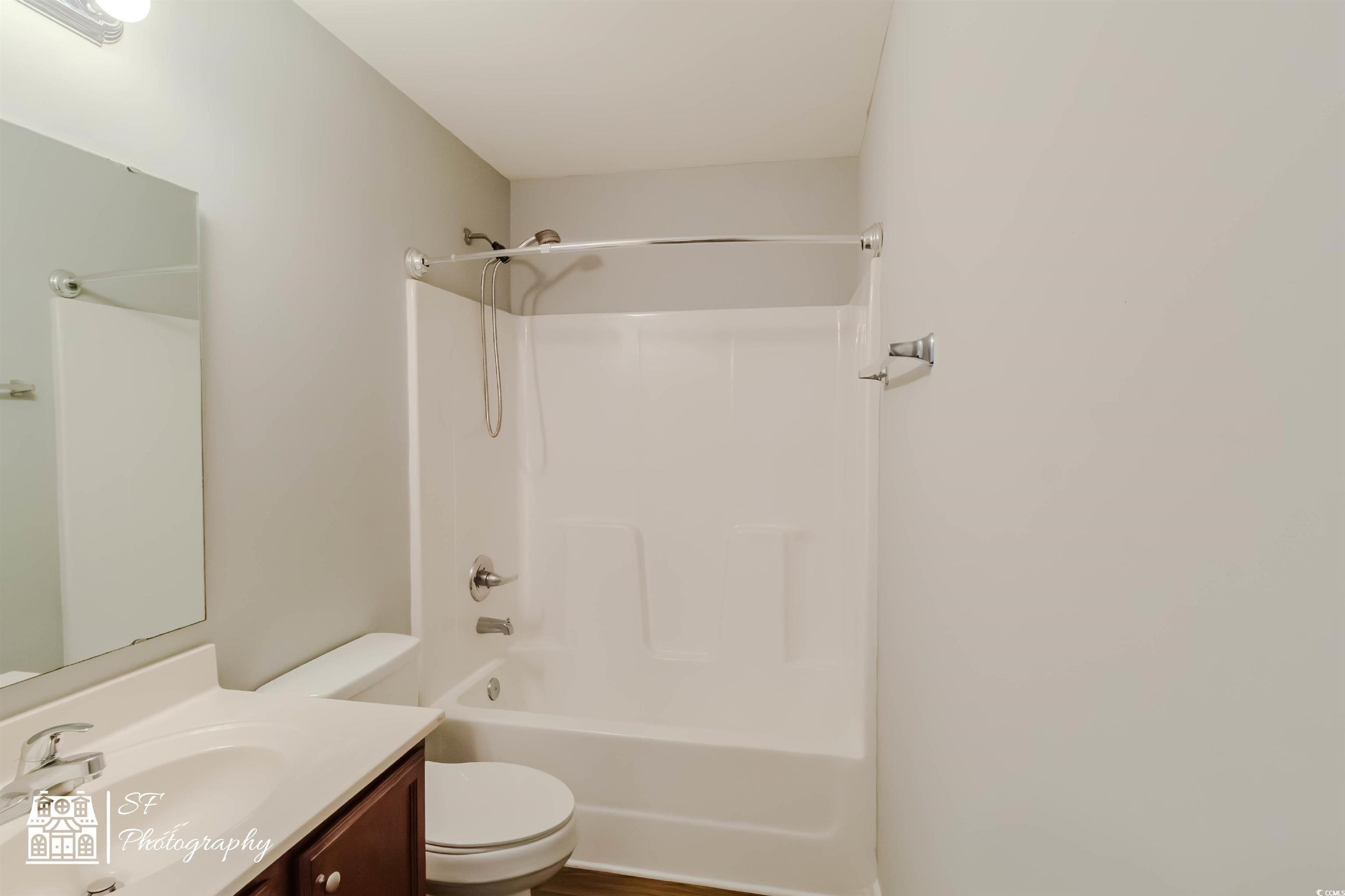 290 Blue Rock Drive Longs, SC 29568 - Photo 7 of 21 Full bathroom with vanity, toilet, and shower / ba
