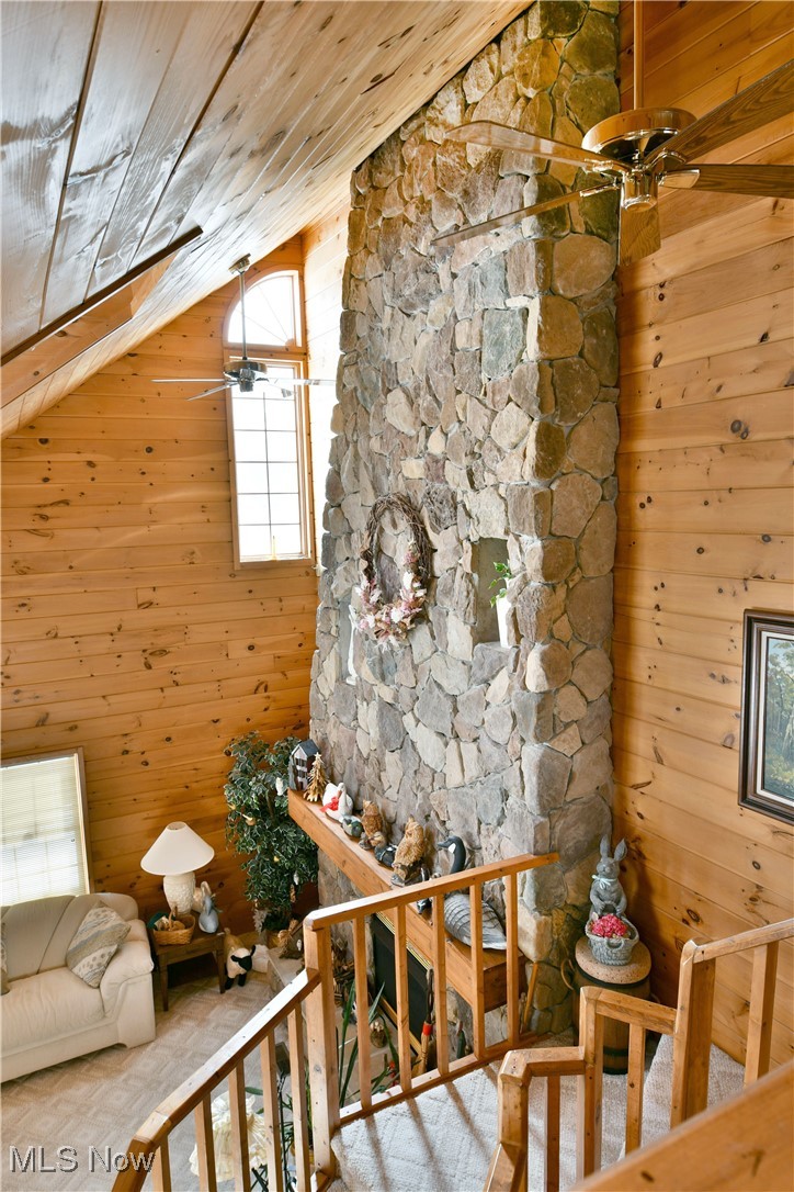 3339 Bushnell Campbell Road Fowler, OH 44418 - Photo 7 of 50 Bonus room featuring wood walls and ceiling fan