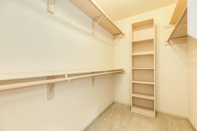 a view of an empty walk in closet