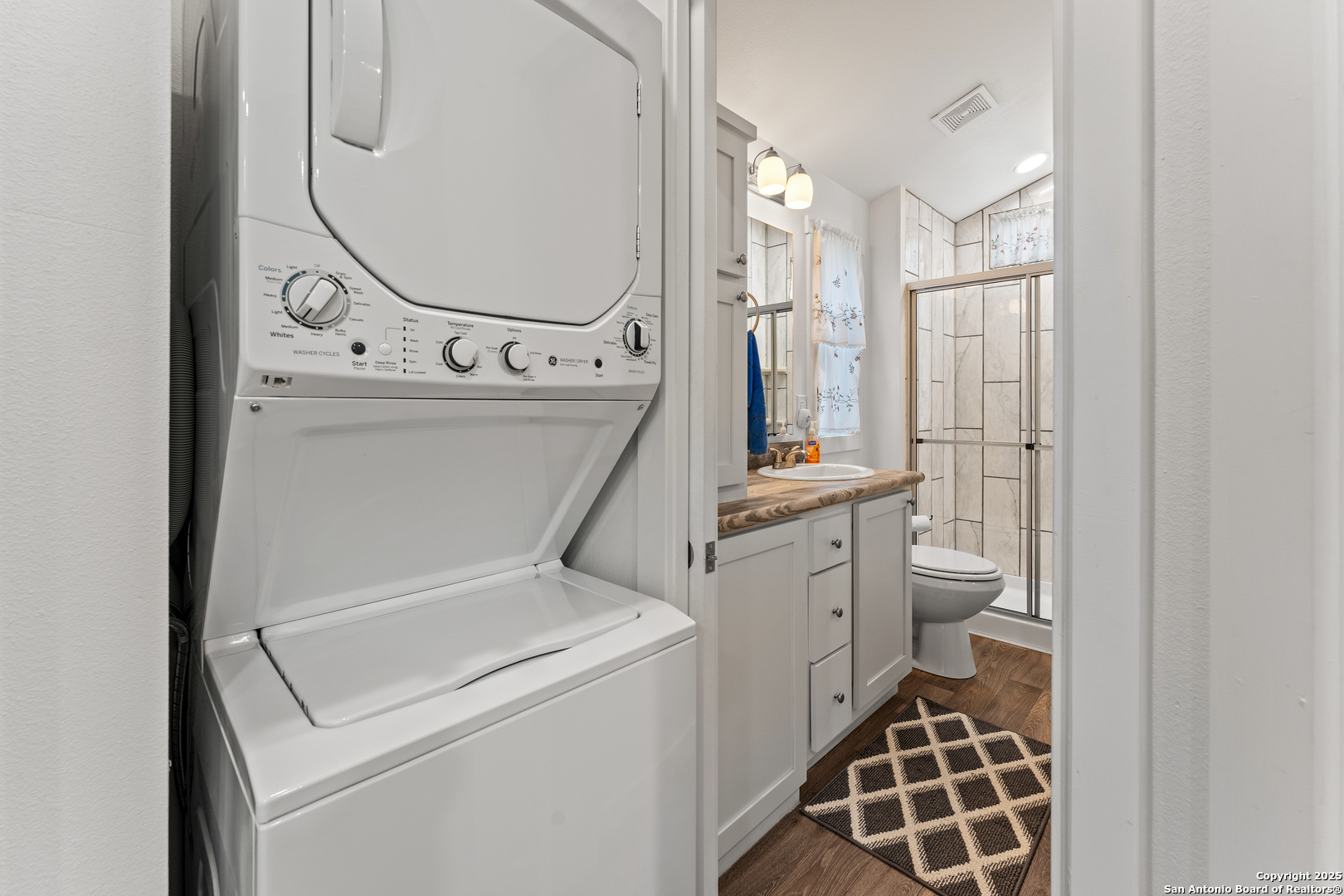 286 Highway 173 Bandera, TX 78003 - Photo 12 of 38 a bathroom with a sink toilet and shower