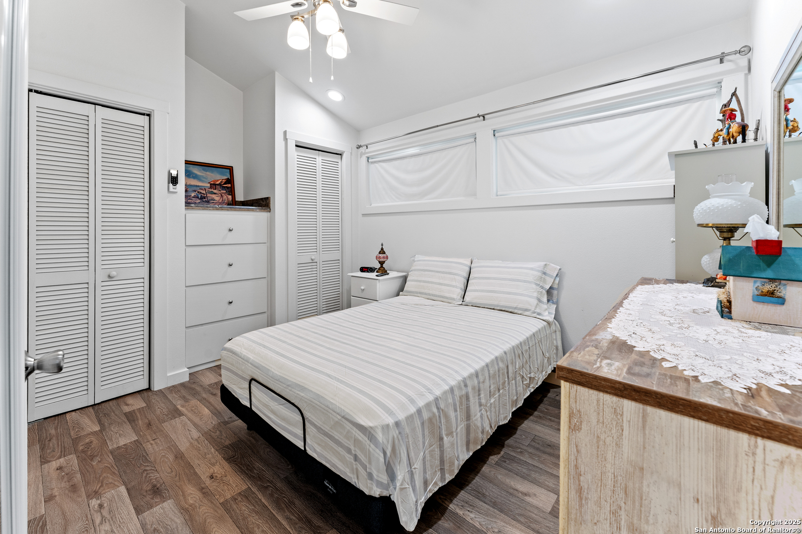 286 Highway 173 Bandera, TX 78003 - Photo 15 of 38 a bedroom with a bed and a dresser