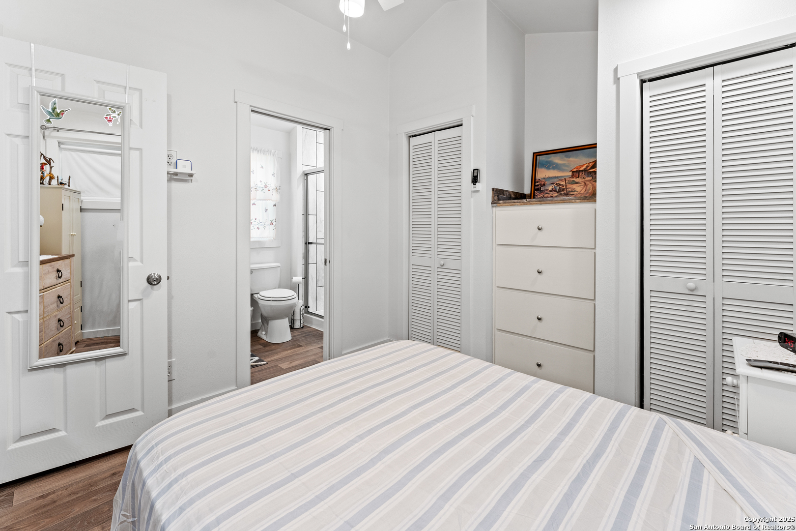 286 Highway 173 Bandera, TX 78003 - Photo 17 of 38 a bedroom with a bed and a closet