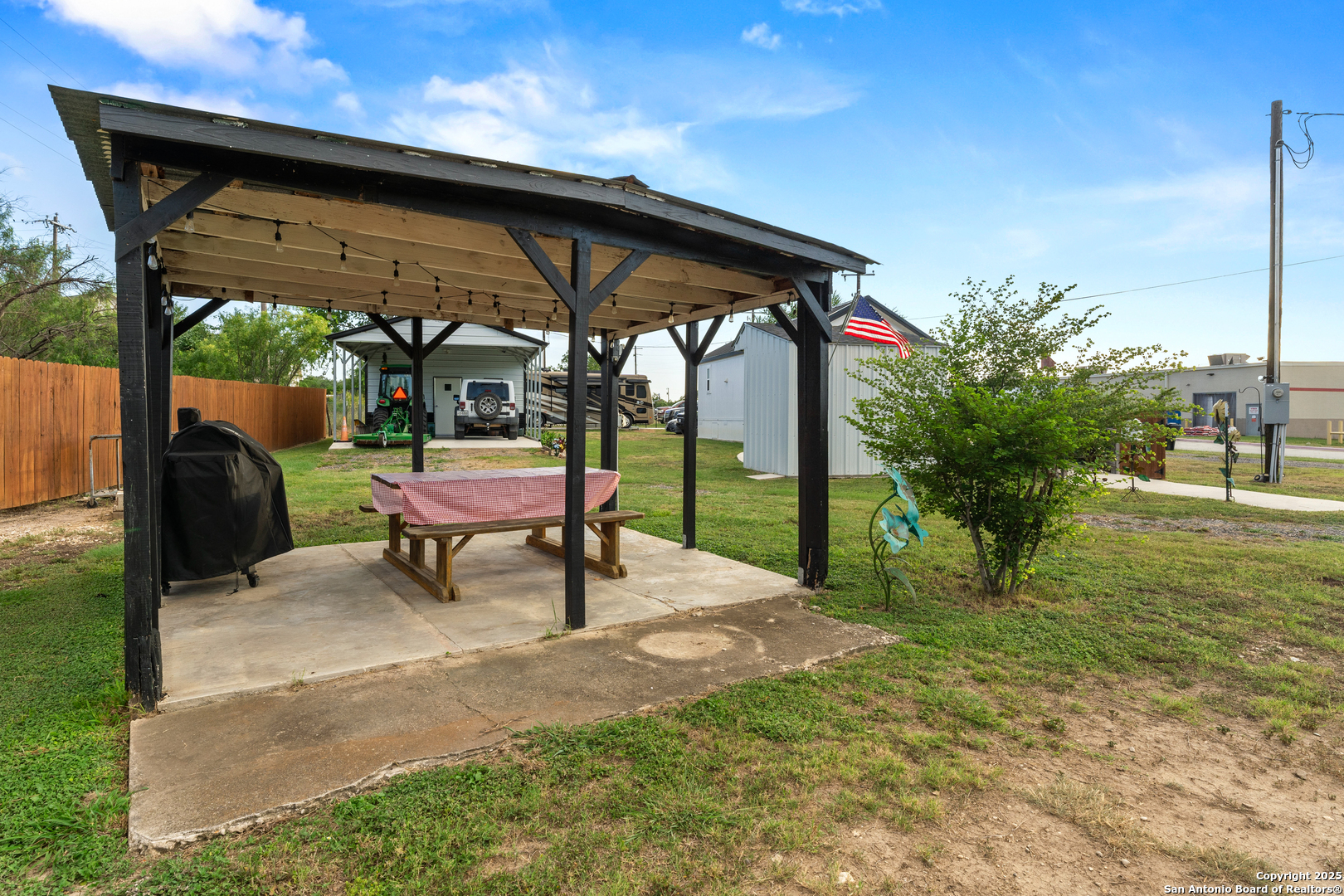 286 Highway 173 Bandera, TX 78003 - Photo 18 of 38 a house view with a sitting space and garden