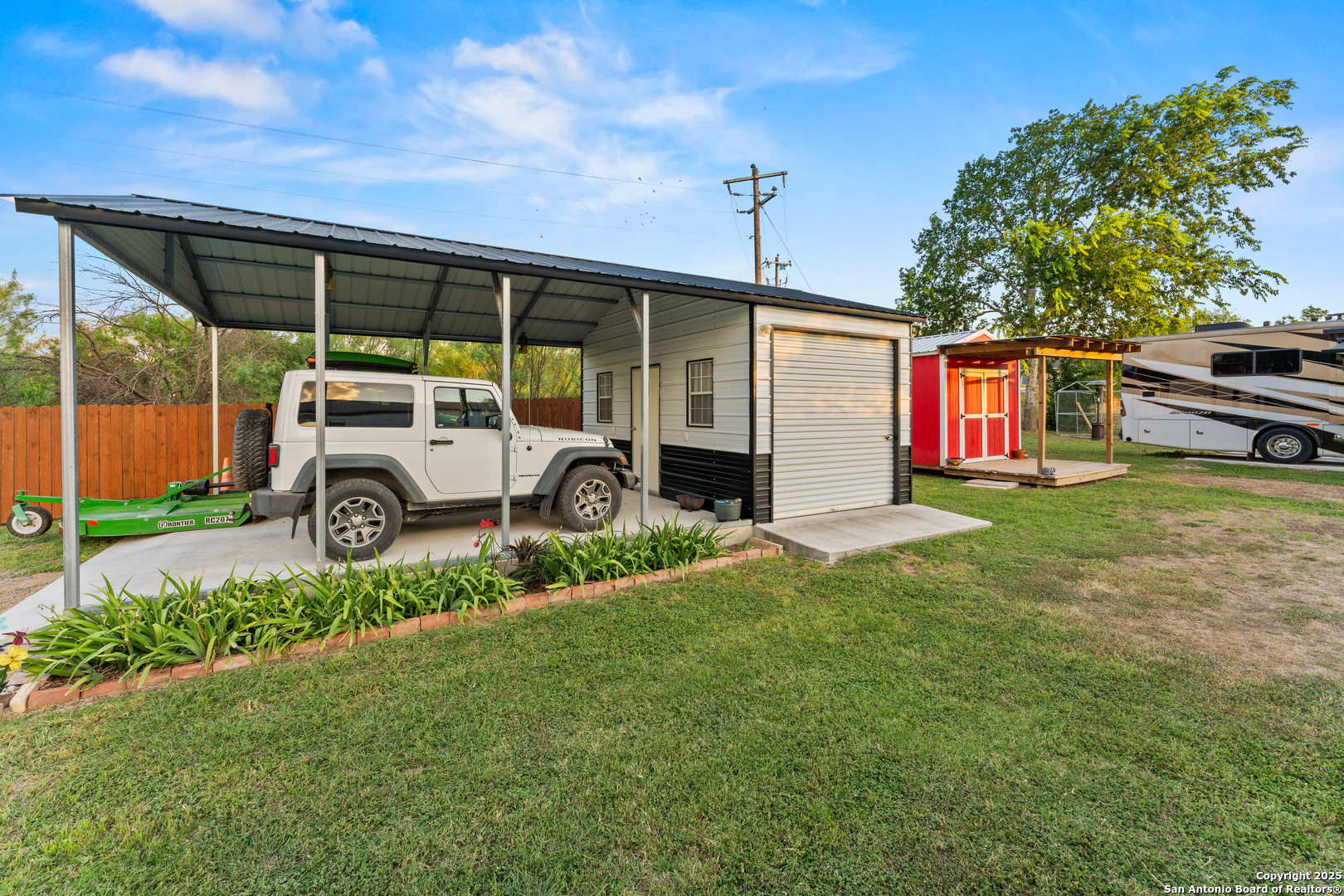 286 Highway 173 Bandera, TX 78003 - Photo 23 of 38 a view of a house with backyard and porch
