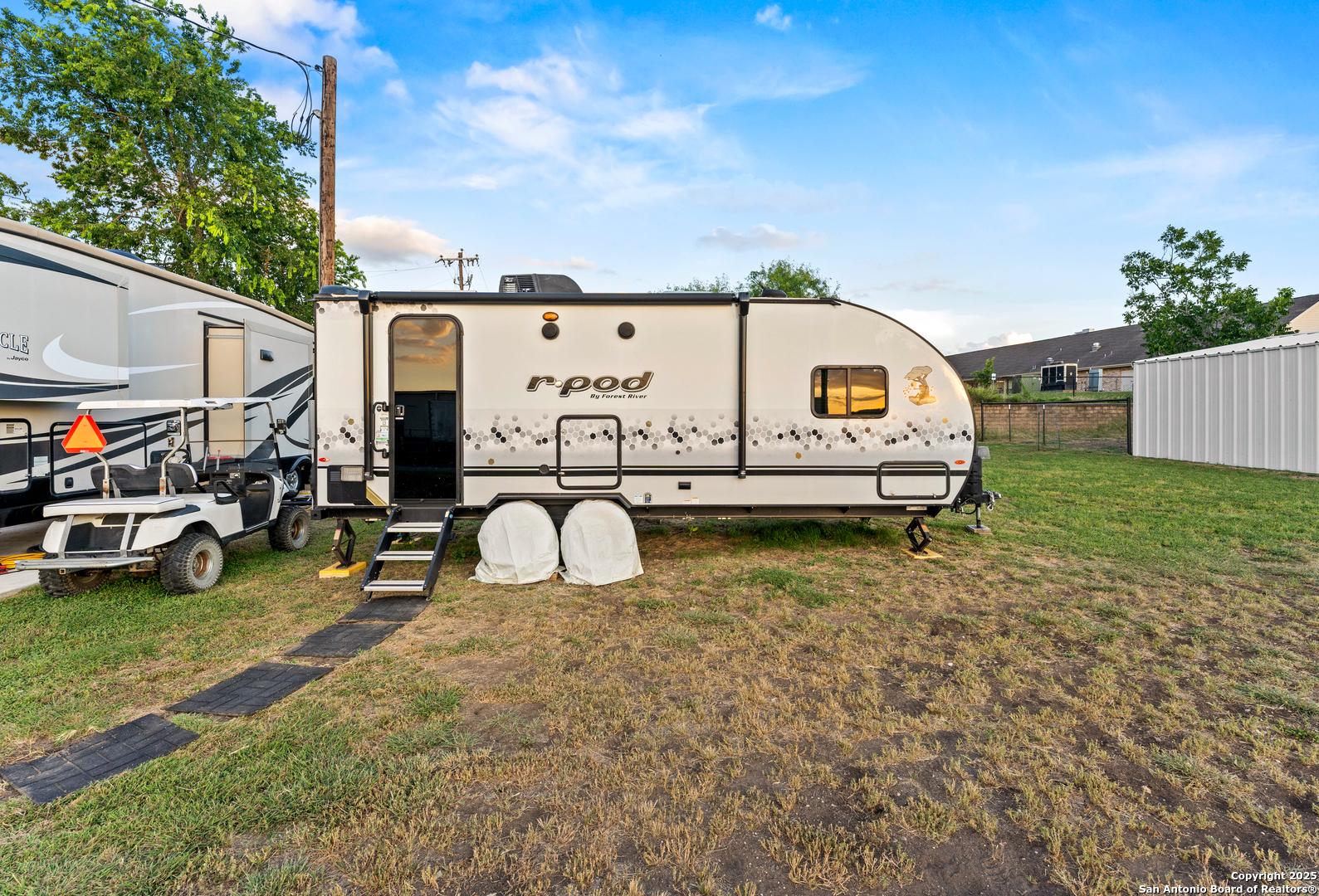 286 Highway 173 Bandera, TX 78003 - Photo 28 of 38 a view of a big house with a patio