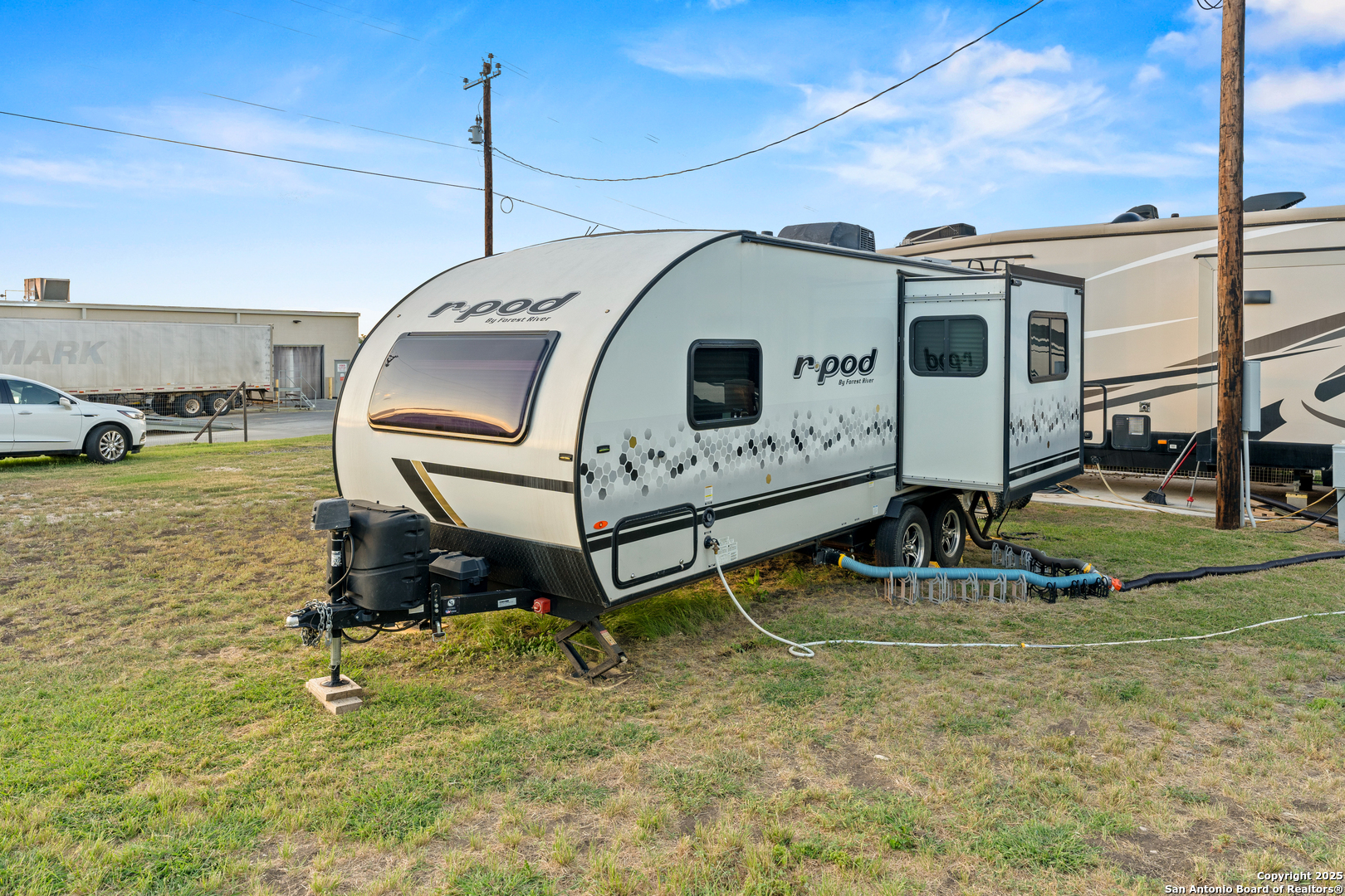 286 Highway 173 Bandera, TX 78003 - Photo 29 of 38 a front view of a house with garden