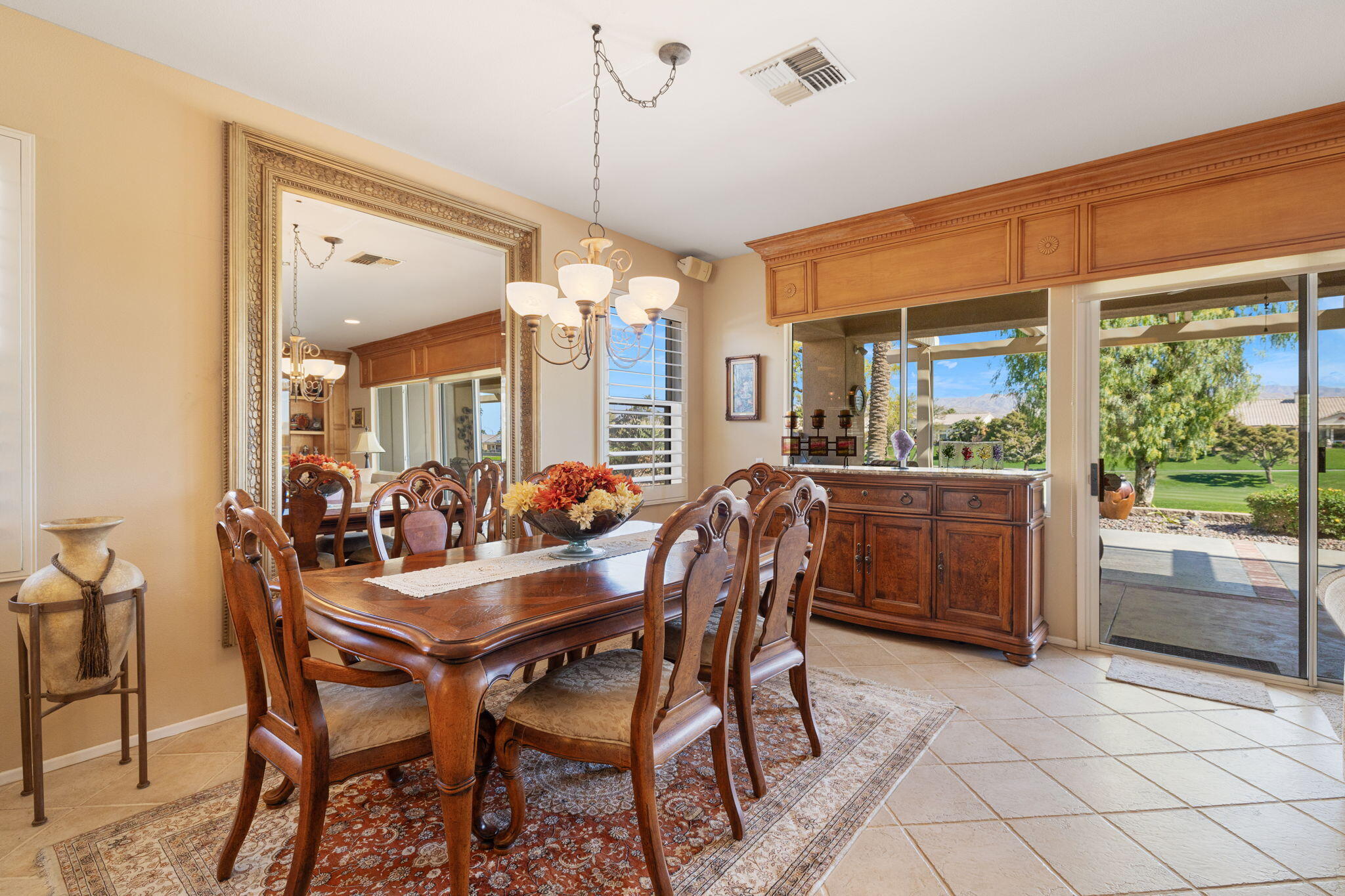 39611 Manorgate Road Palm Desert, CA 92211 - Photo 12 of 45 a dining room with furniture and window