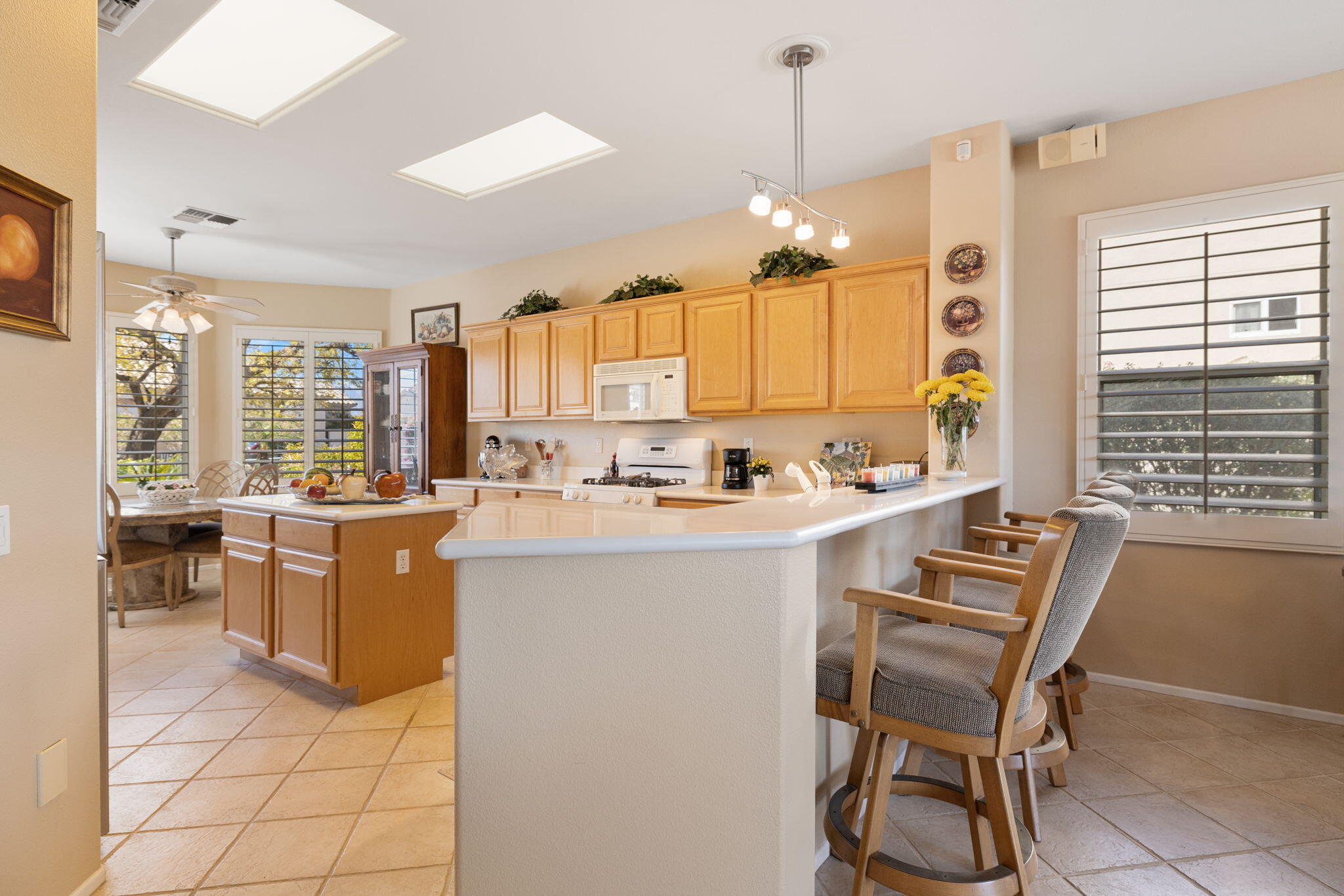 39611 Manorgate Road Palm Desert, CA 92211 - Photo 14 of 45 a kitchen with a window a sink and appliances