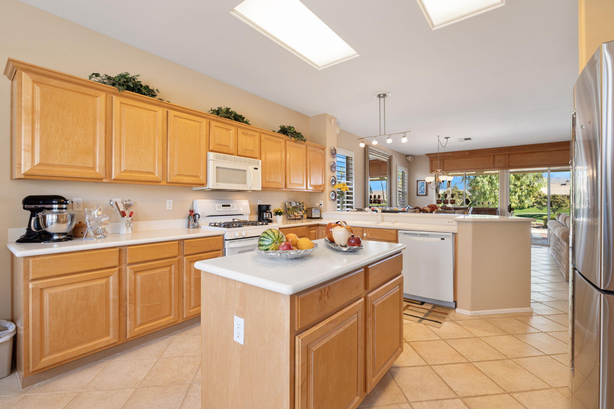 39611 Manorgate Road Palm Desert, CA 92211 - Photo 17 of 45 a kitchen with sink cabinets and window