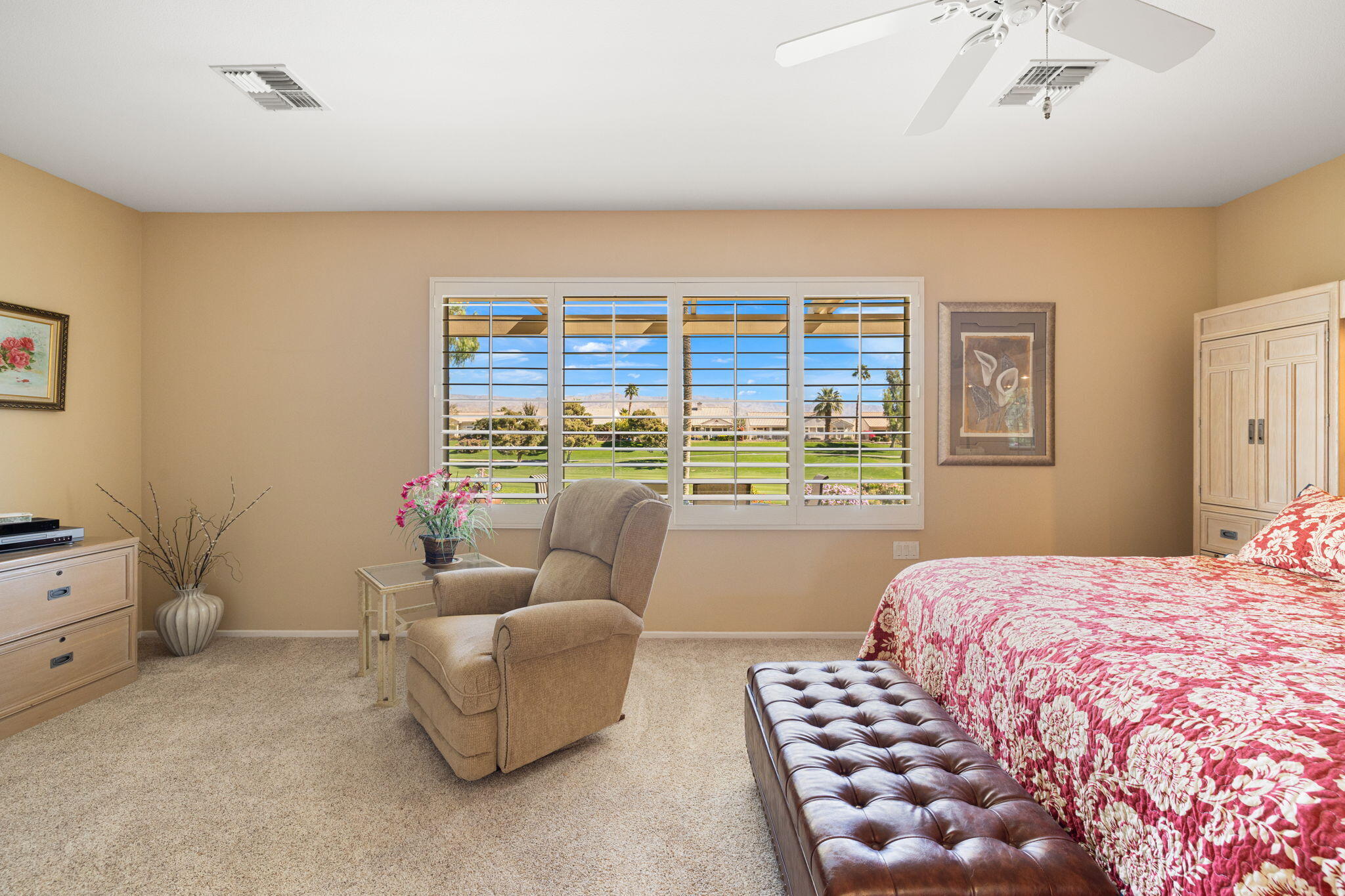 39611 Manorgate Road Palm Desert, CA 92211 - Photo 22 of 45 a bedroom with furniture and a large window
