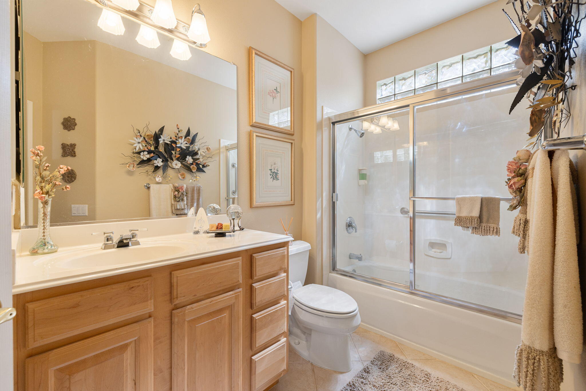 39611 Manorgate Road Palm Desert, CA 92211 - Photo 28 of 45 a bathroom with a sink a toilet and shower