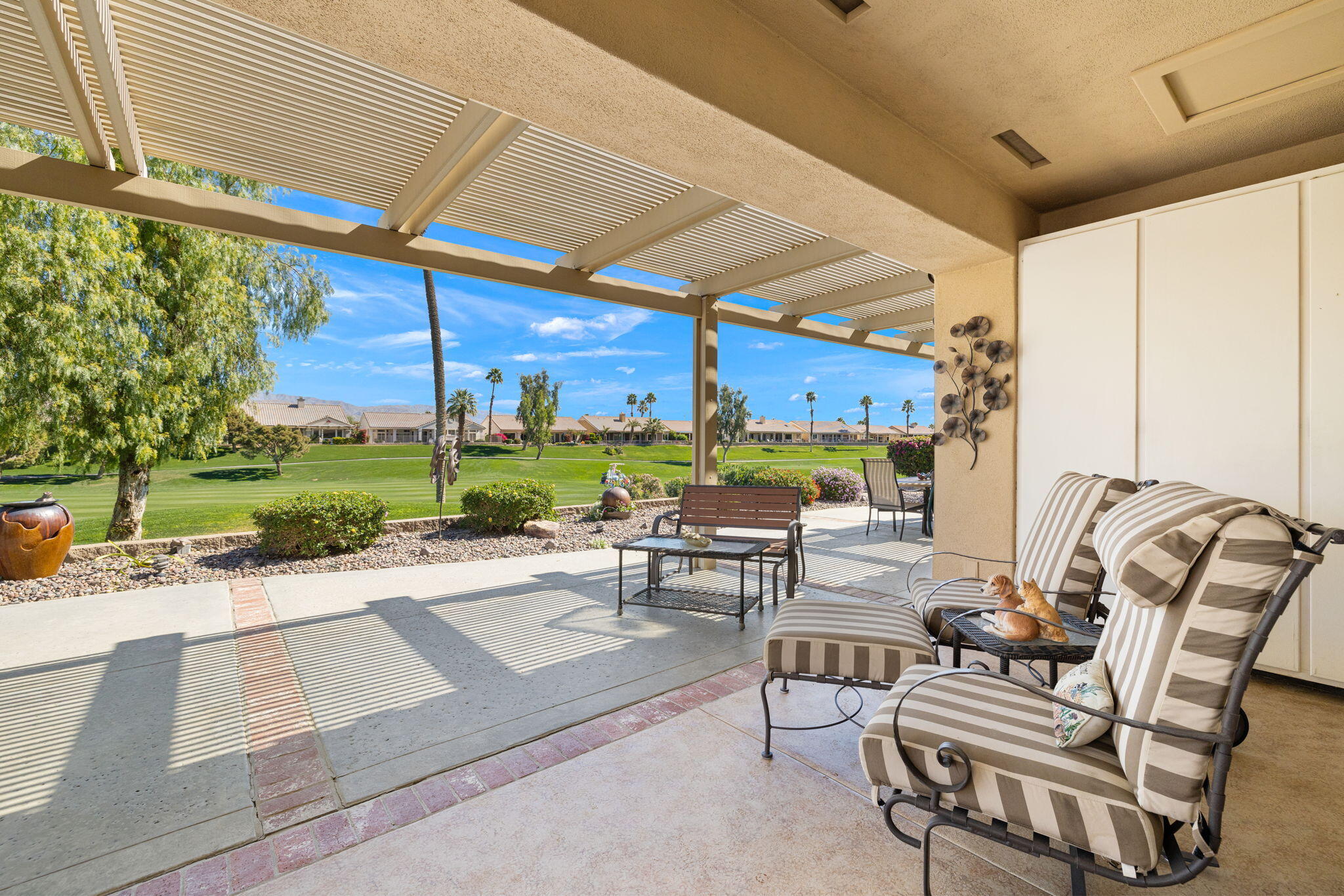 39611 Manorgate Road Palm Desert, CA 92211 - Photo 35 of 45 a building outdoor space with patio furniture and garden