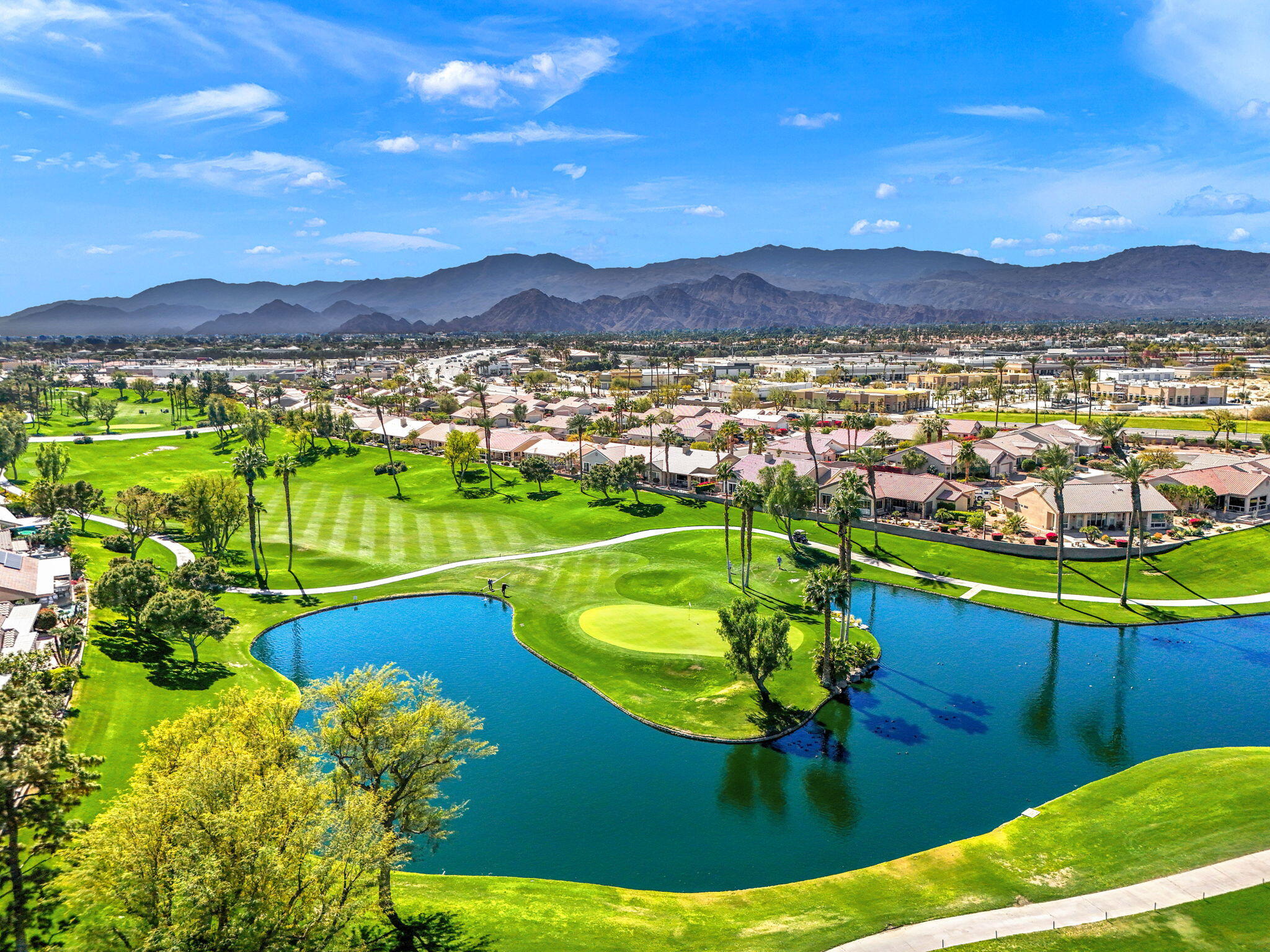 39611 Manorgate Road Palm Desert, CA 92211 - Photo 45 of 45 a view of a swimming pool with a lake view
