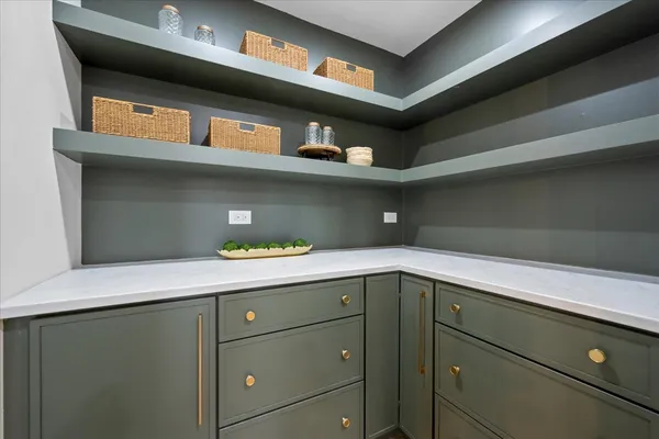 a hallway with cabinets