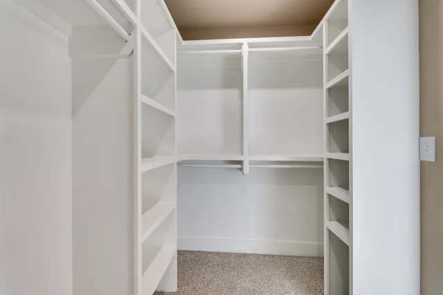 a view of an empty walk in closet
