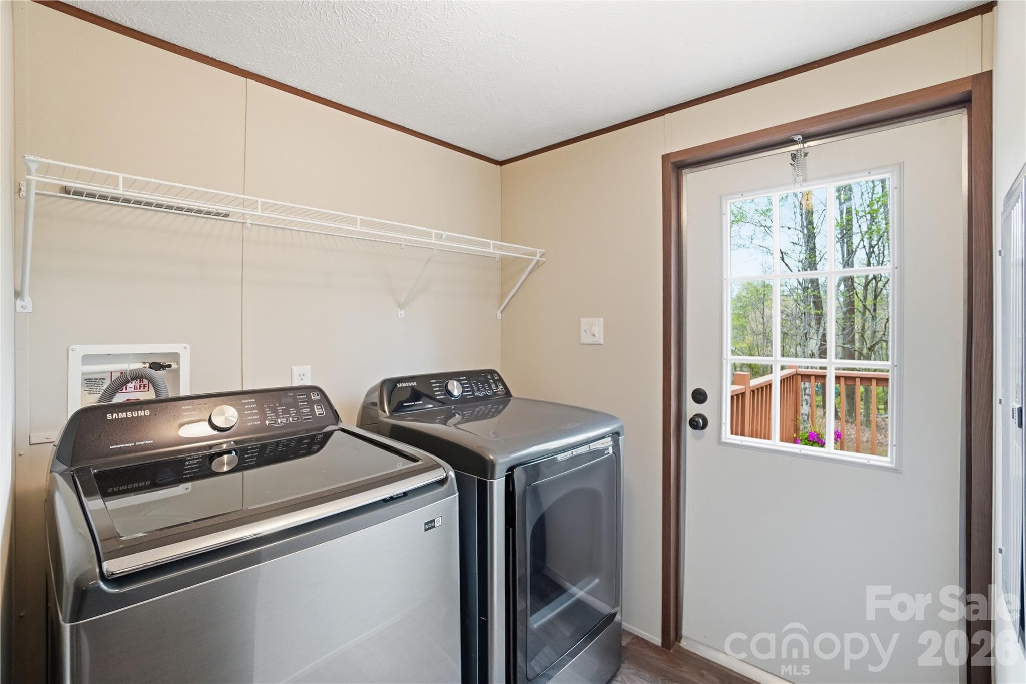 6094 Burnhurst Lane Denver, NC 28037 - Photo 33 of 42 a utility room with dryer and washer