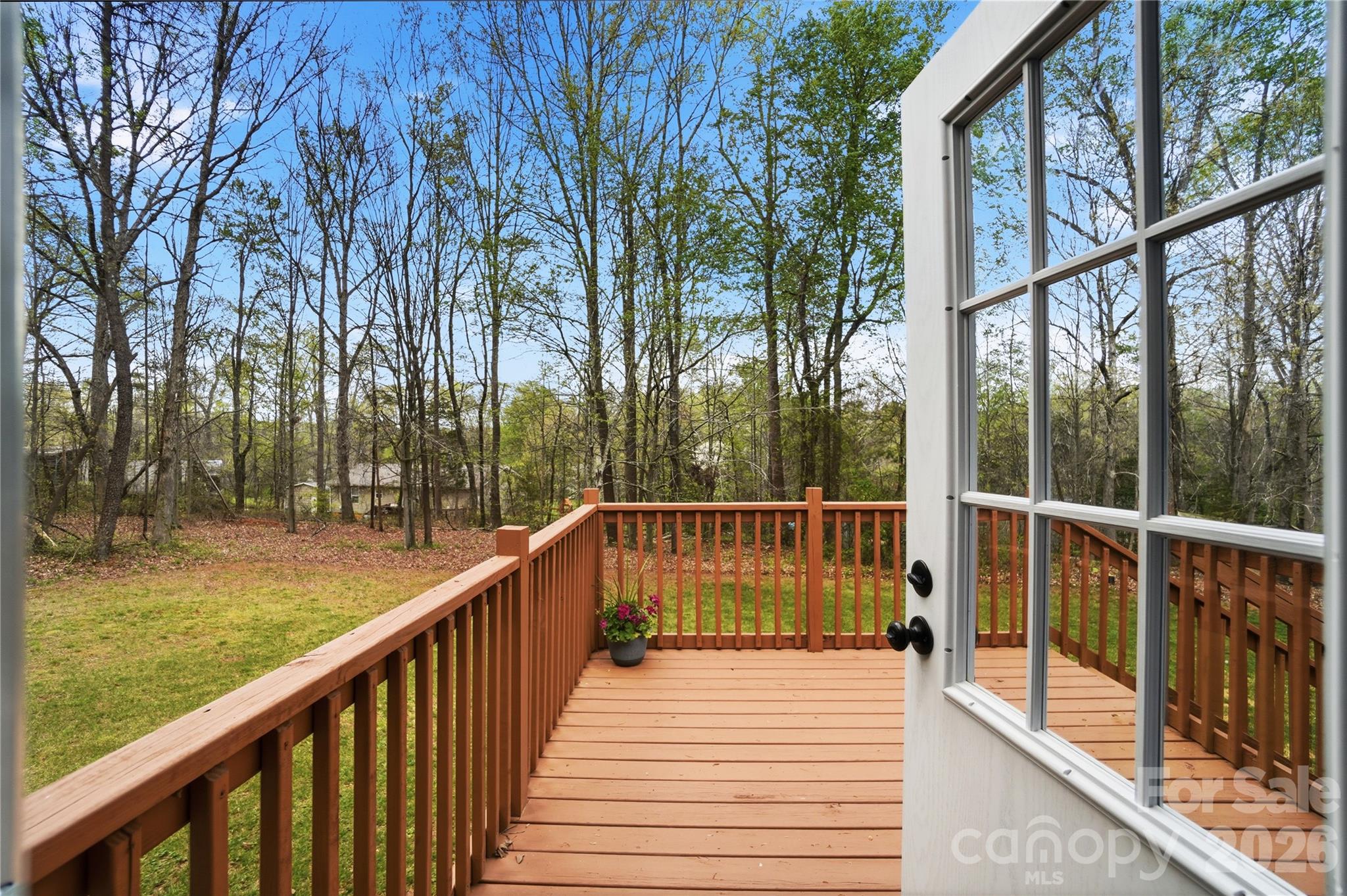 6094 Burnhurst Lane Denver, NC 28037 - Photo 34 of 42 a view of a balcony with trees