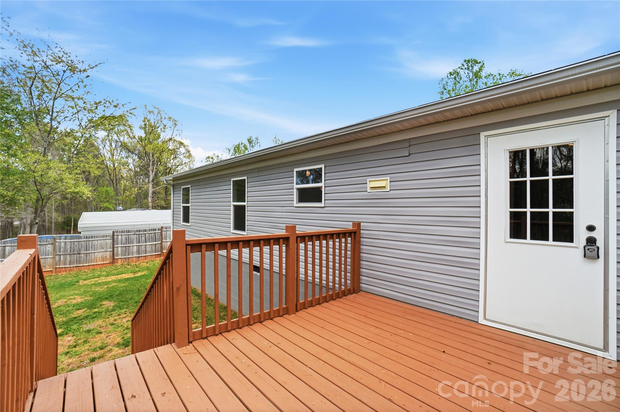 6094 Burnhurst Lane Denver, NC 28037 - Photo 36 of 42 a view of a house with pool deck and wooden floor