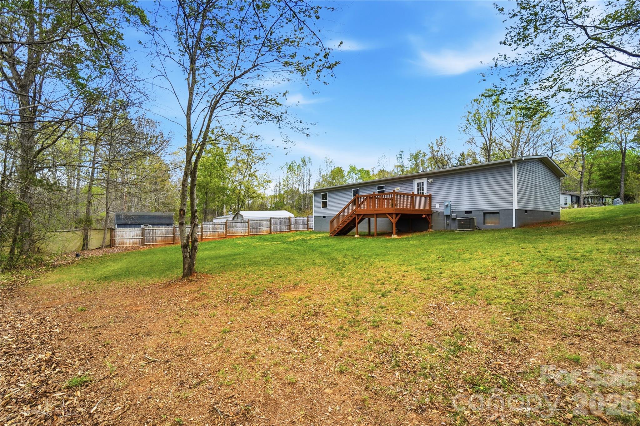 6094 Burnhurst Lane Denver, NC 28037 - Photo 39 of 42 a view of a house with a yard and tree s