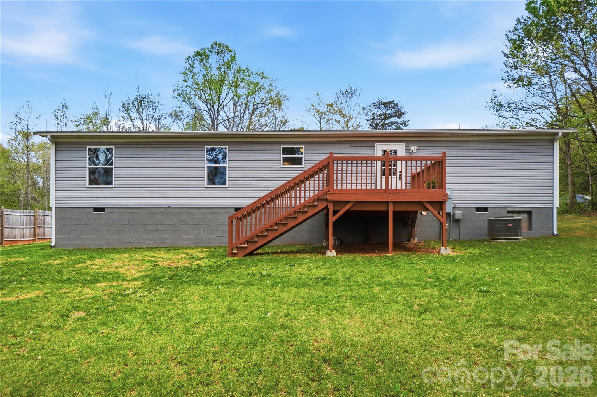 6094 Burnhurst Lane Denver, NC 28037 - Photo 40 of 42 a view of a house with a yard