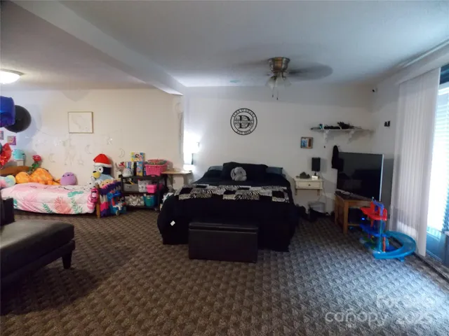 a living room with a couch and a flat screen tv