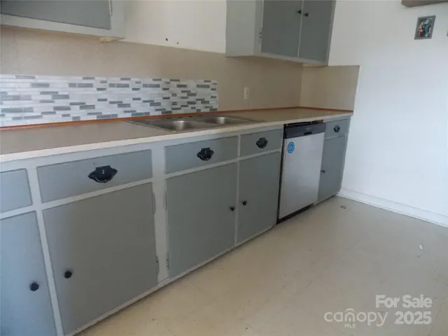 a utility room with washer and dryer