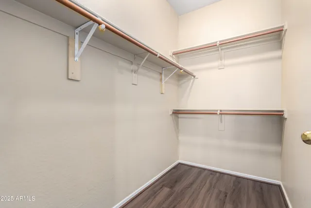 a view of a room with racks on the wall